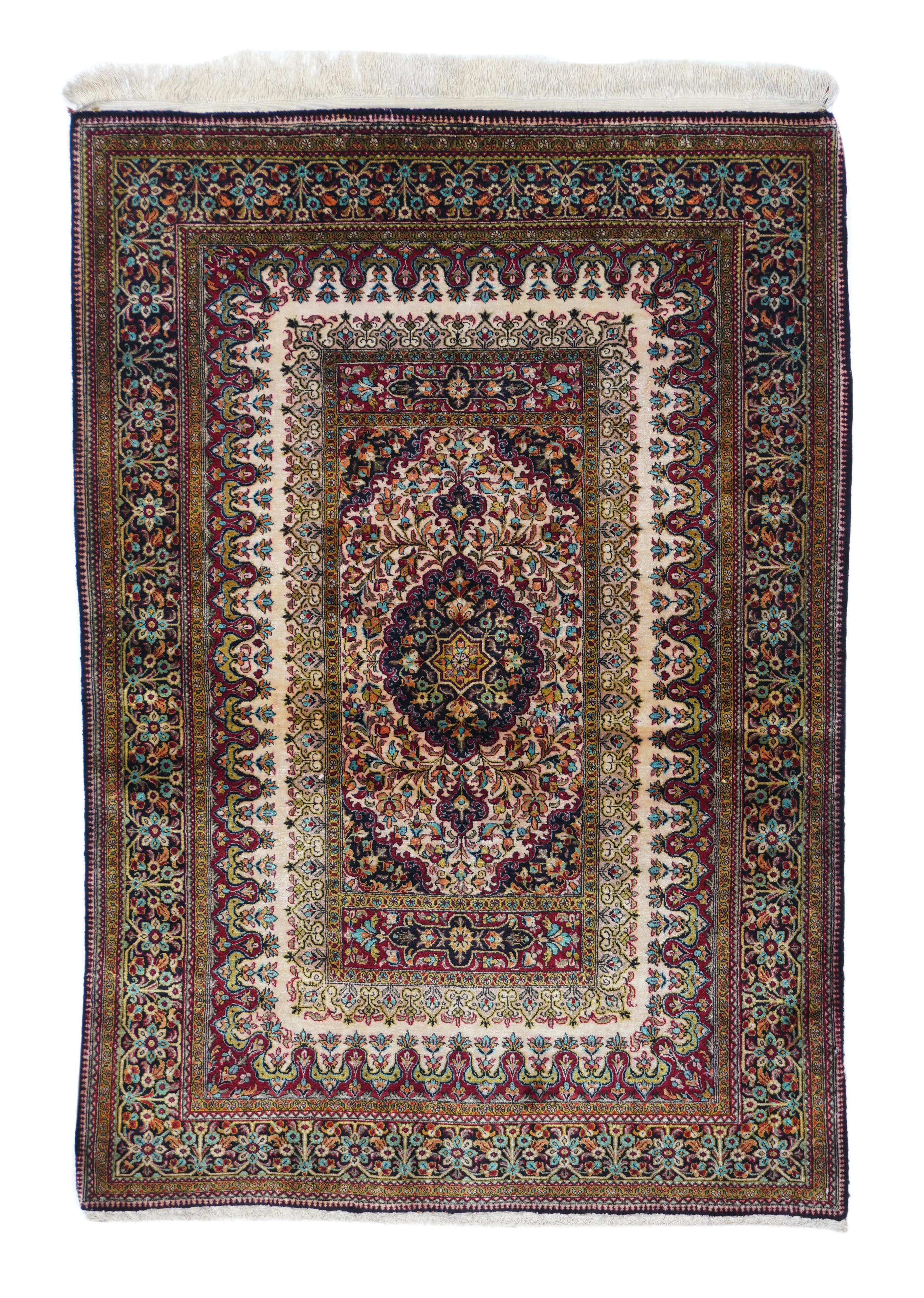 Qum weavers are also known for producing prayer rugs with elegant tree of life designs, as well as compartment designs derived from classical Persian garden carpets. ... The Qum rugs themselves are made of a thin pile in silk and wool, as most Qum