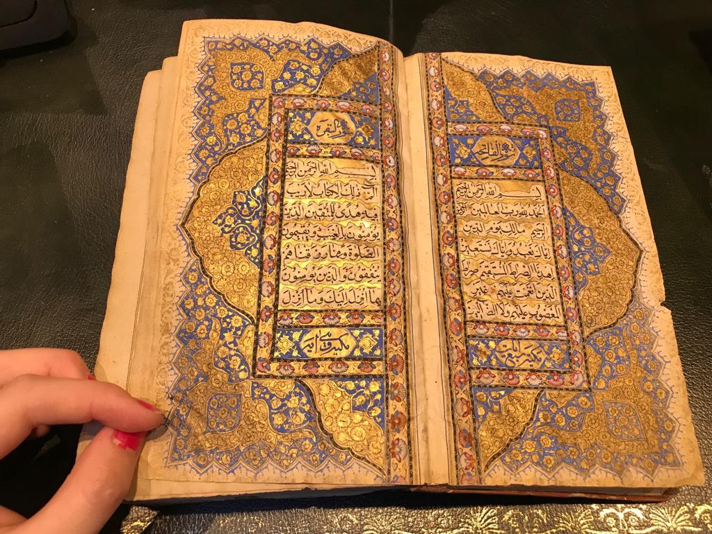 QUR'AN
KASHMIR, NORTH INDIA, DATED AH 1252/1836-37 AD
Arabic manuscript on paper, 372ff. plus six fly-leaves, each folio with 15ll. of black naskh script on gold-speckled paper, each line within black and gold rules, sura headings in blue thuluth