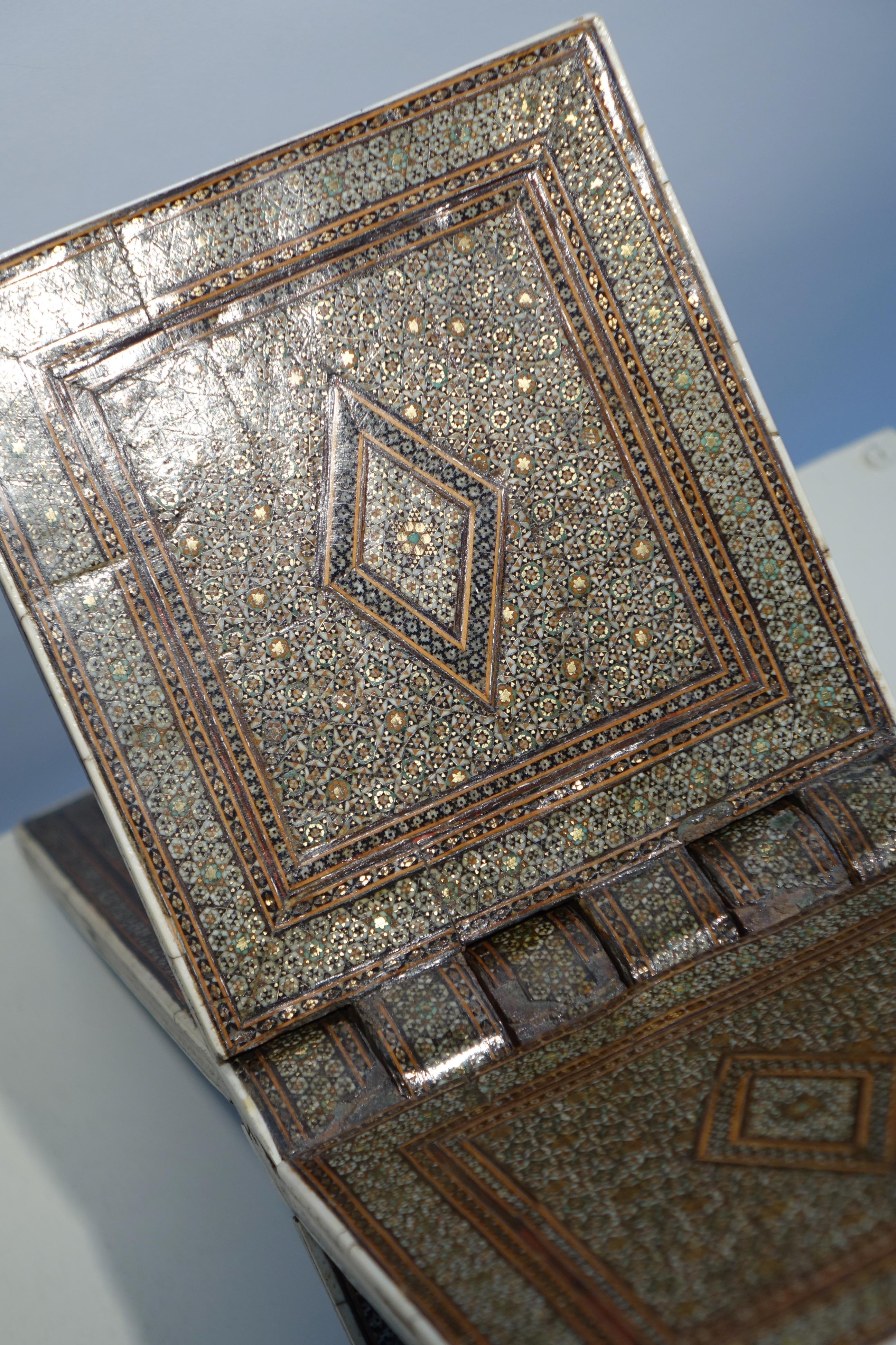 Khatam kari is a fine, meticulous marquetry technique whose earliest examples date back to the Safavid period (1501-1730). This technique involves inlaying fine wood, brass or camel bone rods to create motifs, usually star-shaped. Ivory, gold or