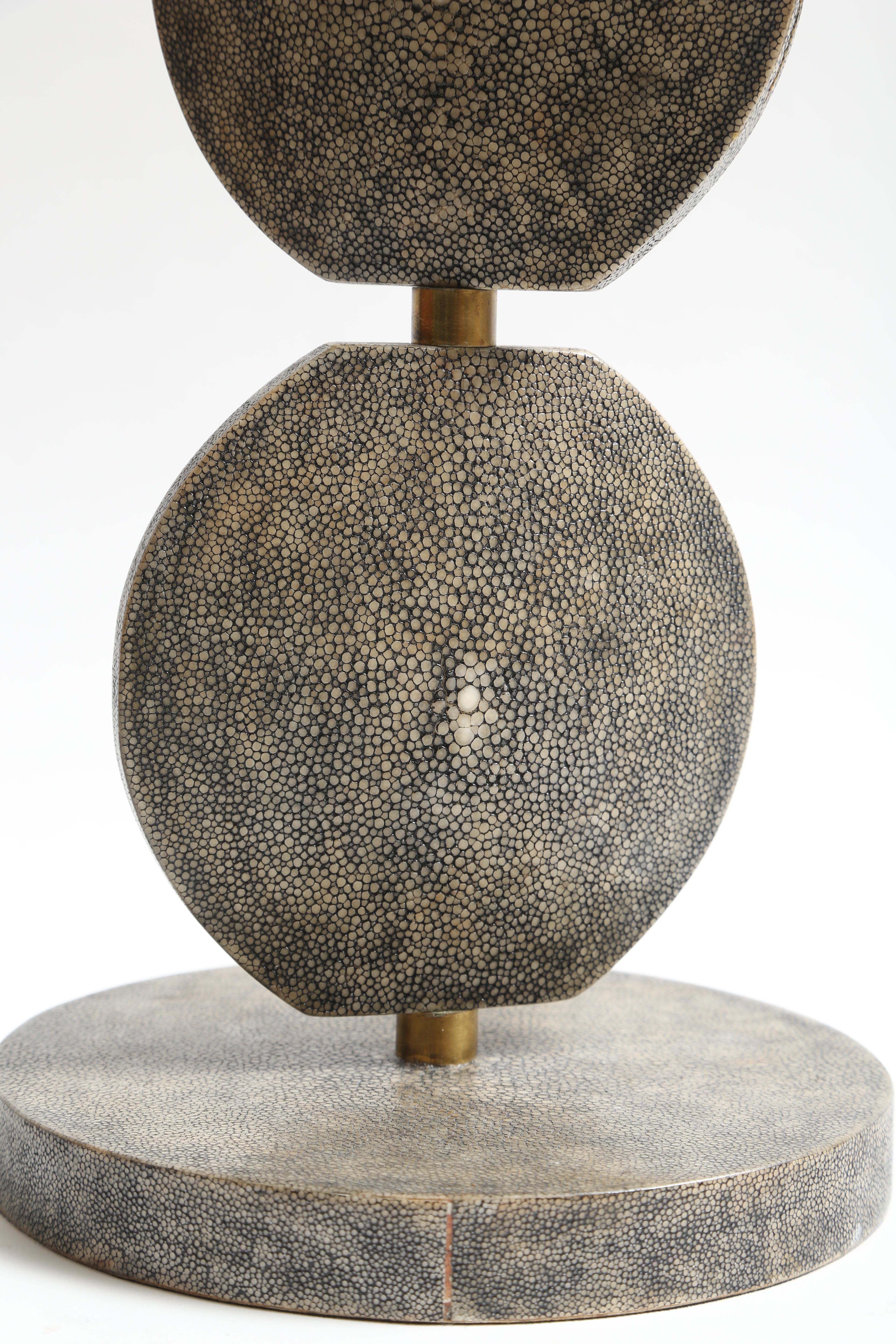 A fine example of R and Y Augousti.
The disks can be manipulated 365 Degrees.
Another Augousti lamp in Lizard skin is also listed.