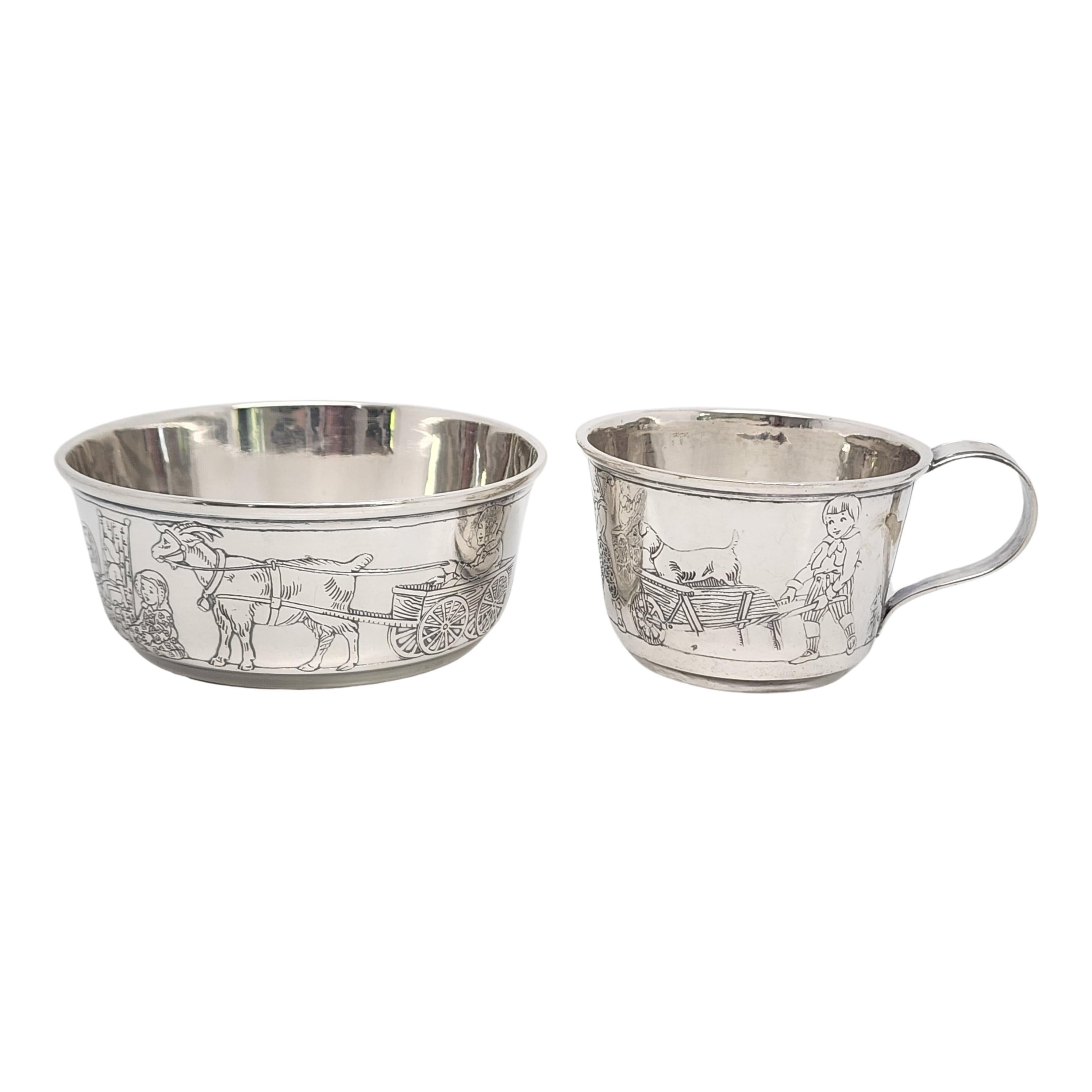 Sterling silver child's bowl and cup by R. Blackinton & Co, with monogram.

Monogram appears to be RWS on both pieces.

A beautiful etched design with classic, timeless appeal, this child's bowl and cup features classic scenes from childhood.

Bowl