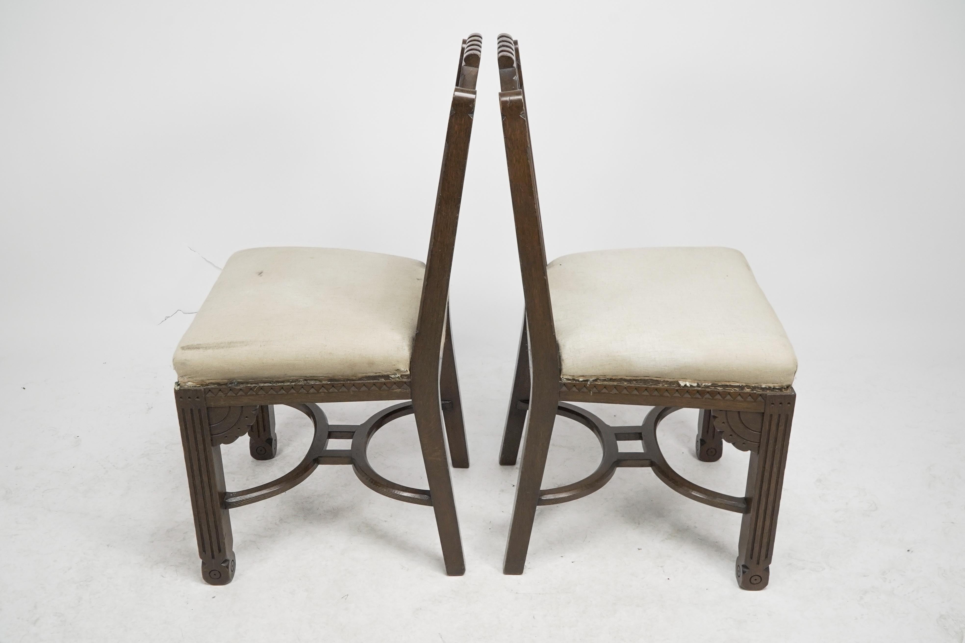 English R Boyd. in the style of Dr C Dresser. A pair of oak side chairs For Sale