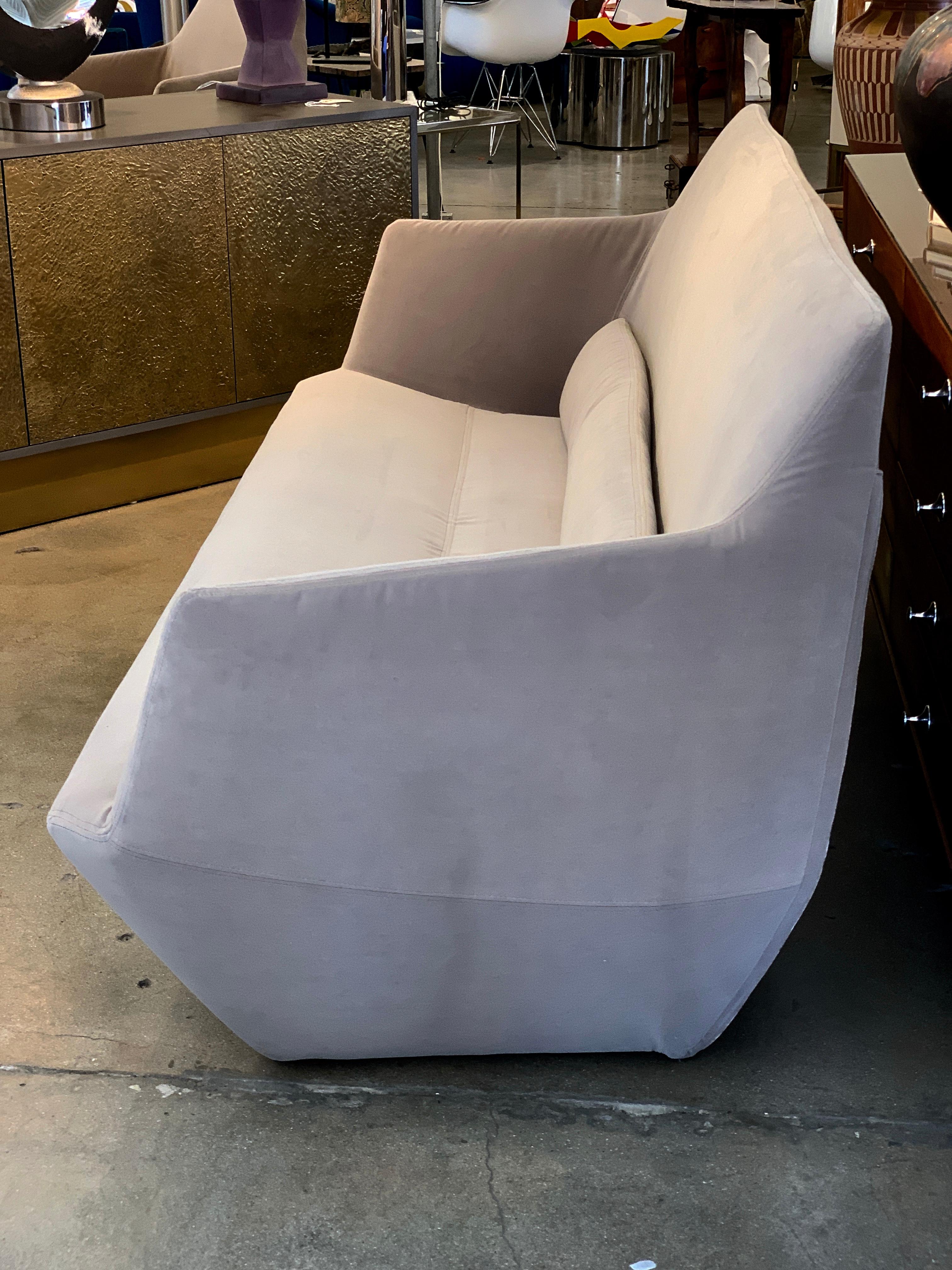 Ronan and Erwan Bouroullec Facett settee designed for Ligne Roset redone in a Knoll Velvet Fabric. We have updated the upholstery and eliminated the interior stitching. The fabric is Oh La La Taupe by Knoll Textiles. We had the Label reattached and