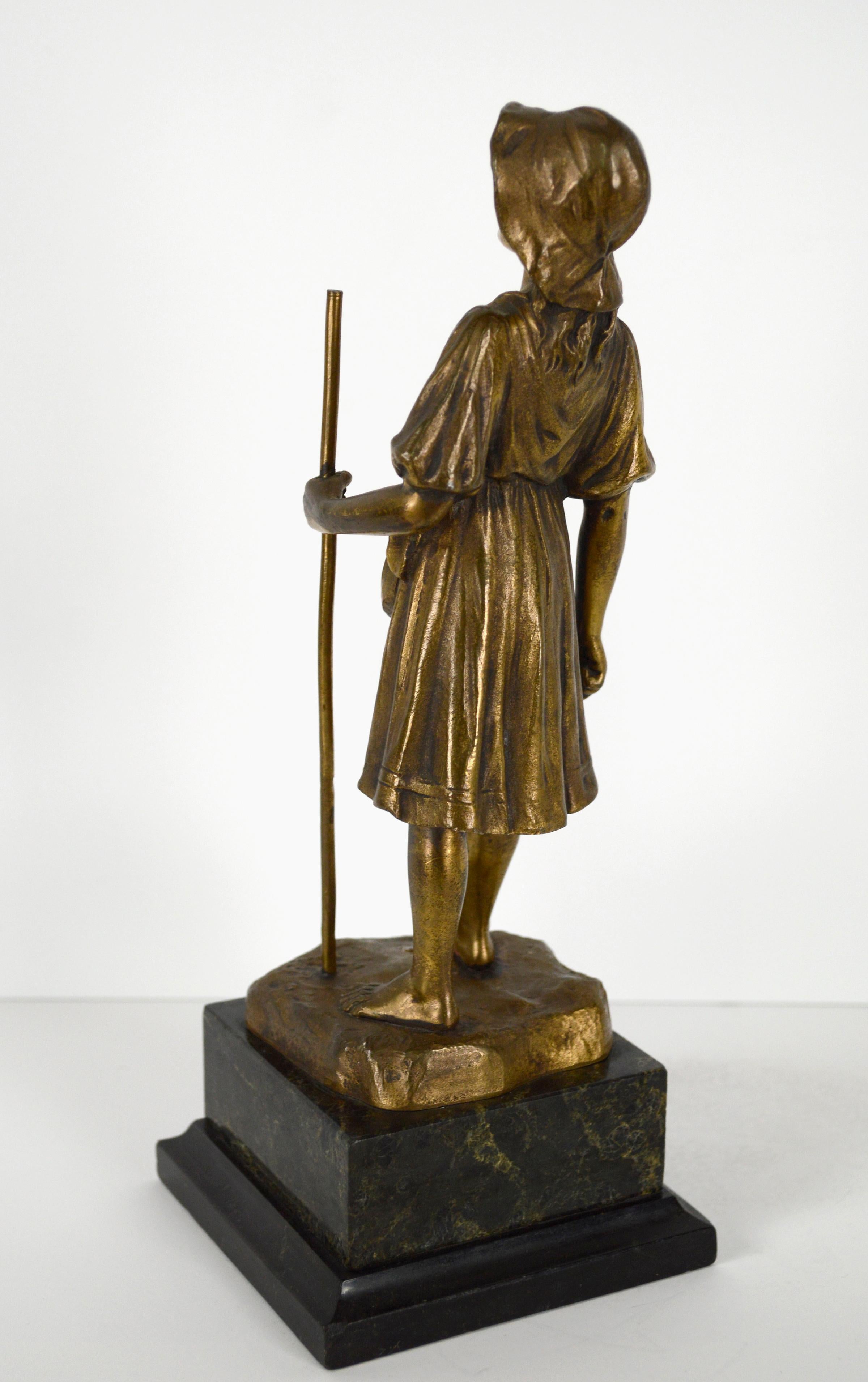 Wonderful miniature bronze cast figurative sculpture of a young barefoot shepherd girl holding a staff by R. Hobold (German, 19th c). The girl is dressed in a flowing peasant dress and floppy hat, and has one foot forward as if taking a