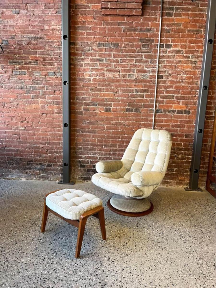 We are thrilled to offer this vintage Canadian scoop chair and ottoman by R. Huber, coveted for its amazing condition and exceptional comfort. Wrapped in a beautifully striped corduroy fabric, the chair swivels wtih ease, has removable armrests for