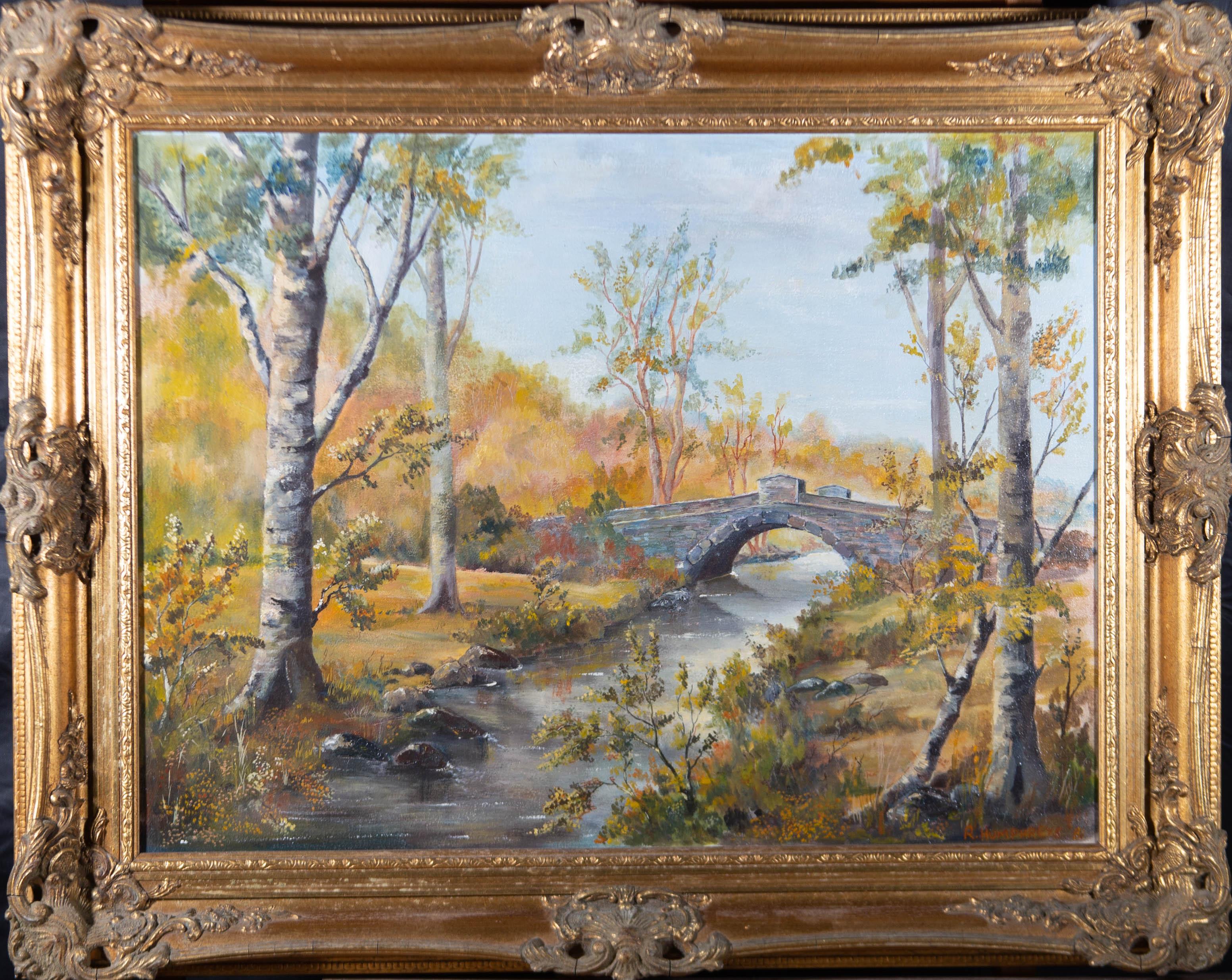 A landscape featuring a stone bridge crossing a river, surrounded by autumnal trees. Presented in an ornate pierced gilt-effect frame. Signed and dated to the lower-right edge. On canvas on stretchers.
