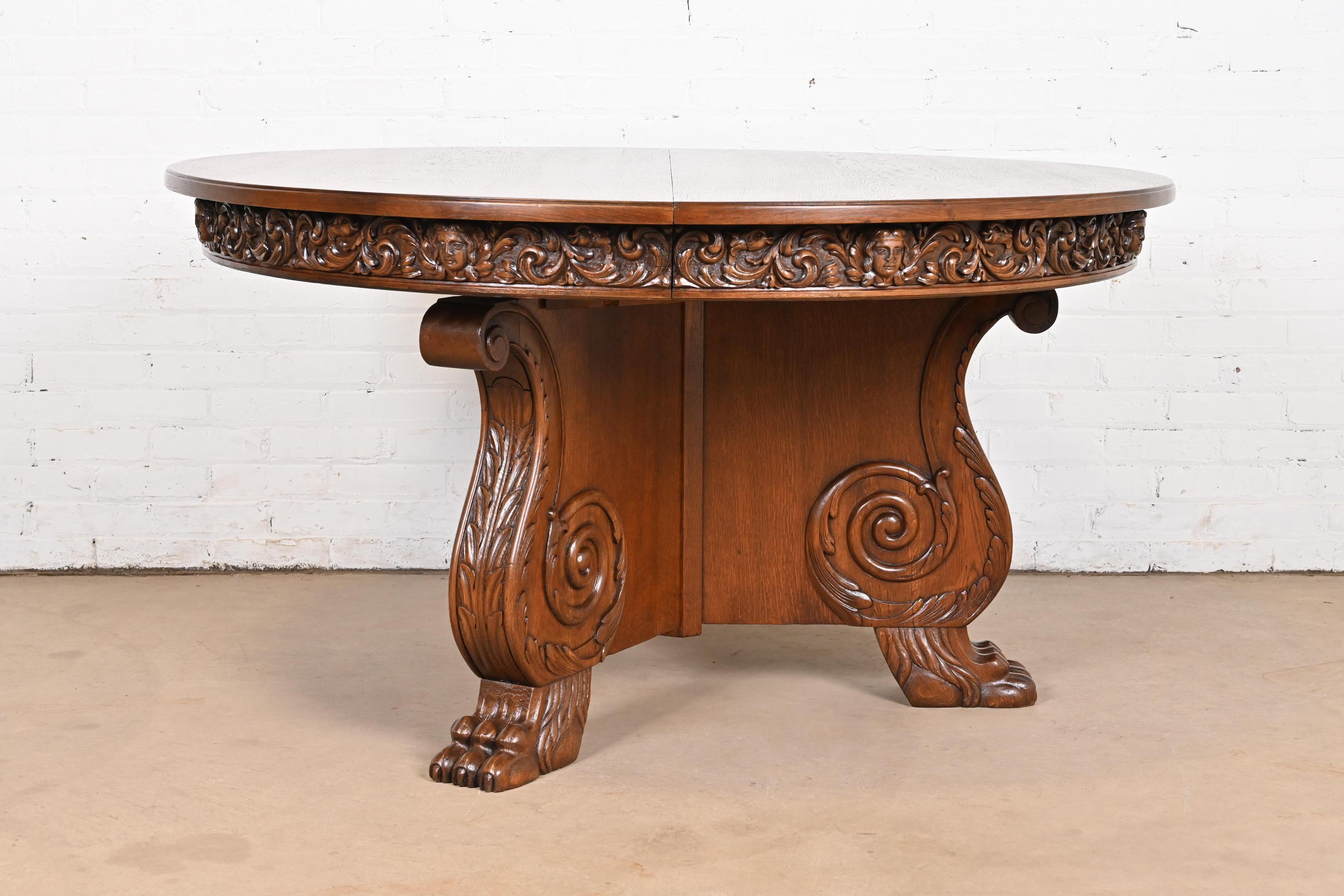 R. J. Horner Antique Victorian Carved Pedestal Pedestal Dining Table (Table à manger à rallonge en chêne sculpté) Bon état - En vente à South Bend, IN