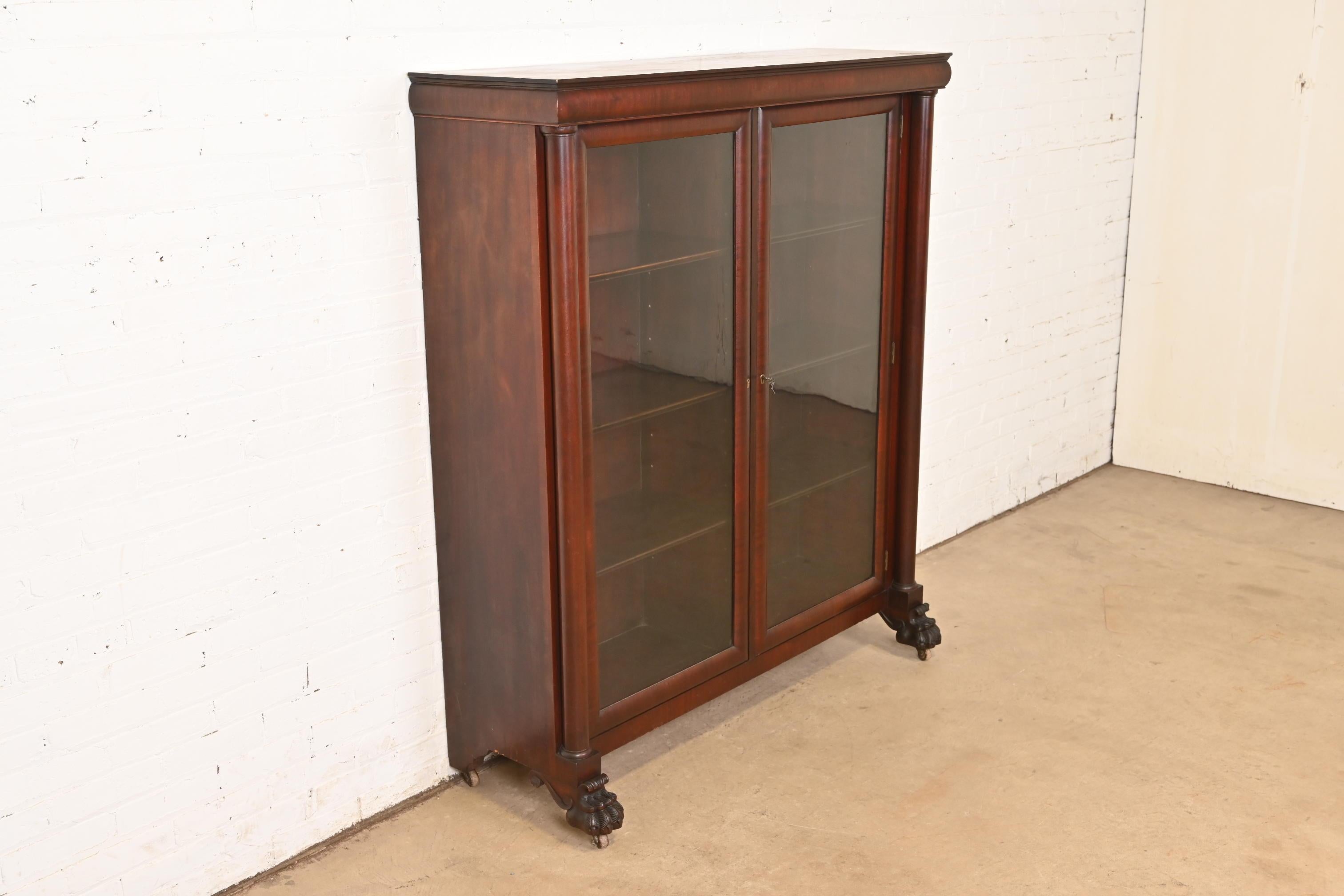 19th Century R. J. Horner Style American Empire Carved Mahogany Double Bookcase For Sale