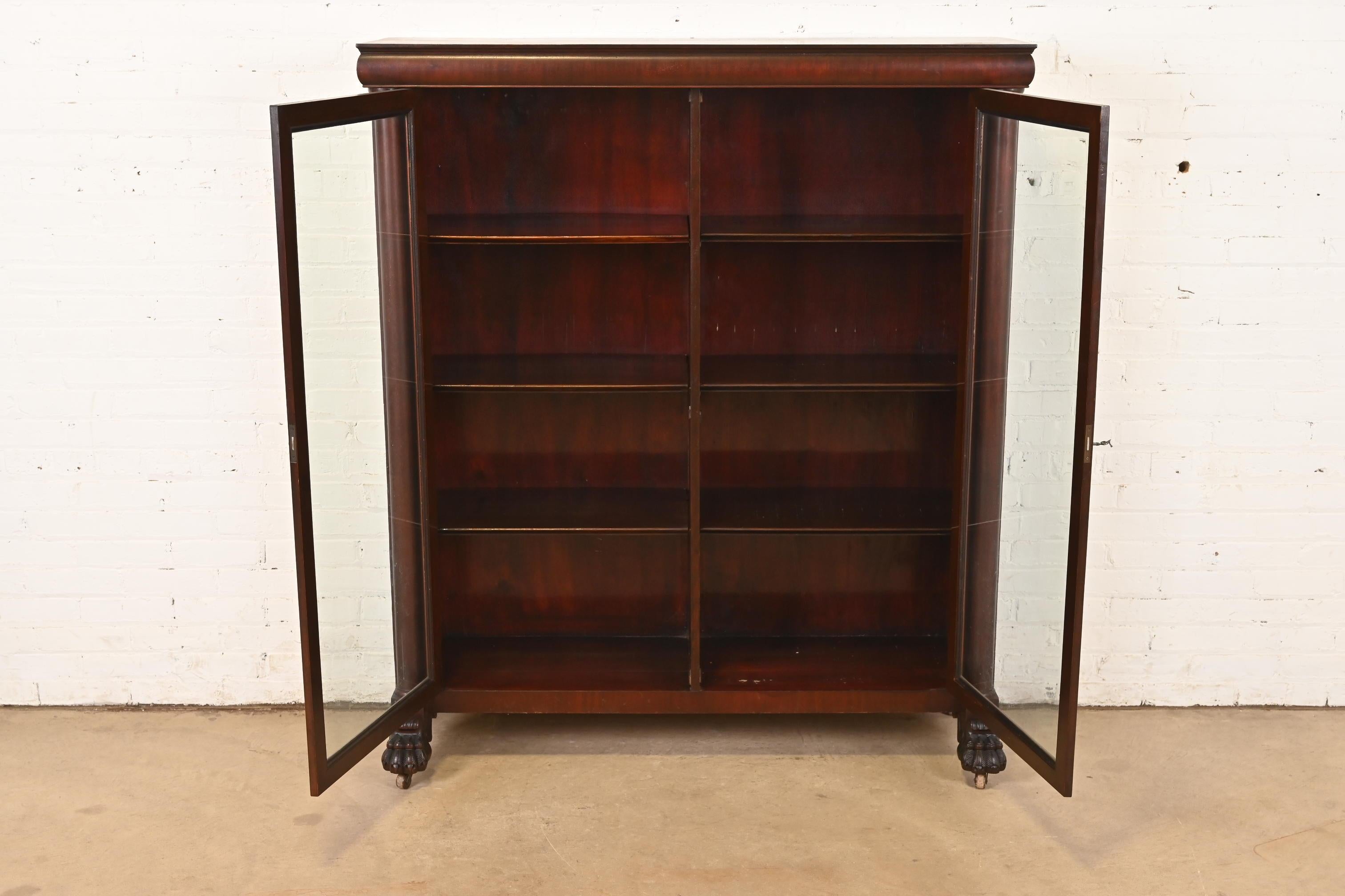 Glass R. J. Horner Style American Empire Carved Mahogany Double Bookcase For Sale