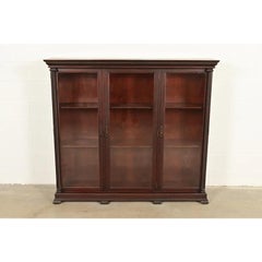 R. J. Horner Style American Empire Carved Mahogany Triple Bookcase, Circa 1890s