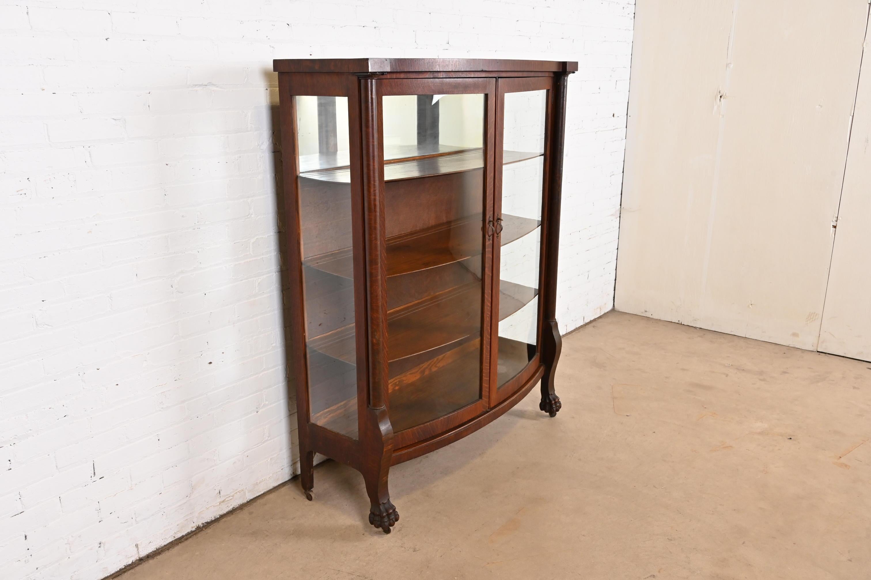 Late 19th Century R. J. Horner Style Antique American Empire Oak Bow Front Bookcase Cabinet