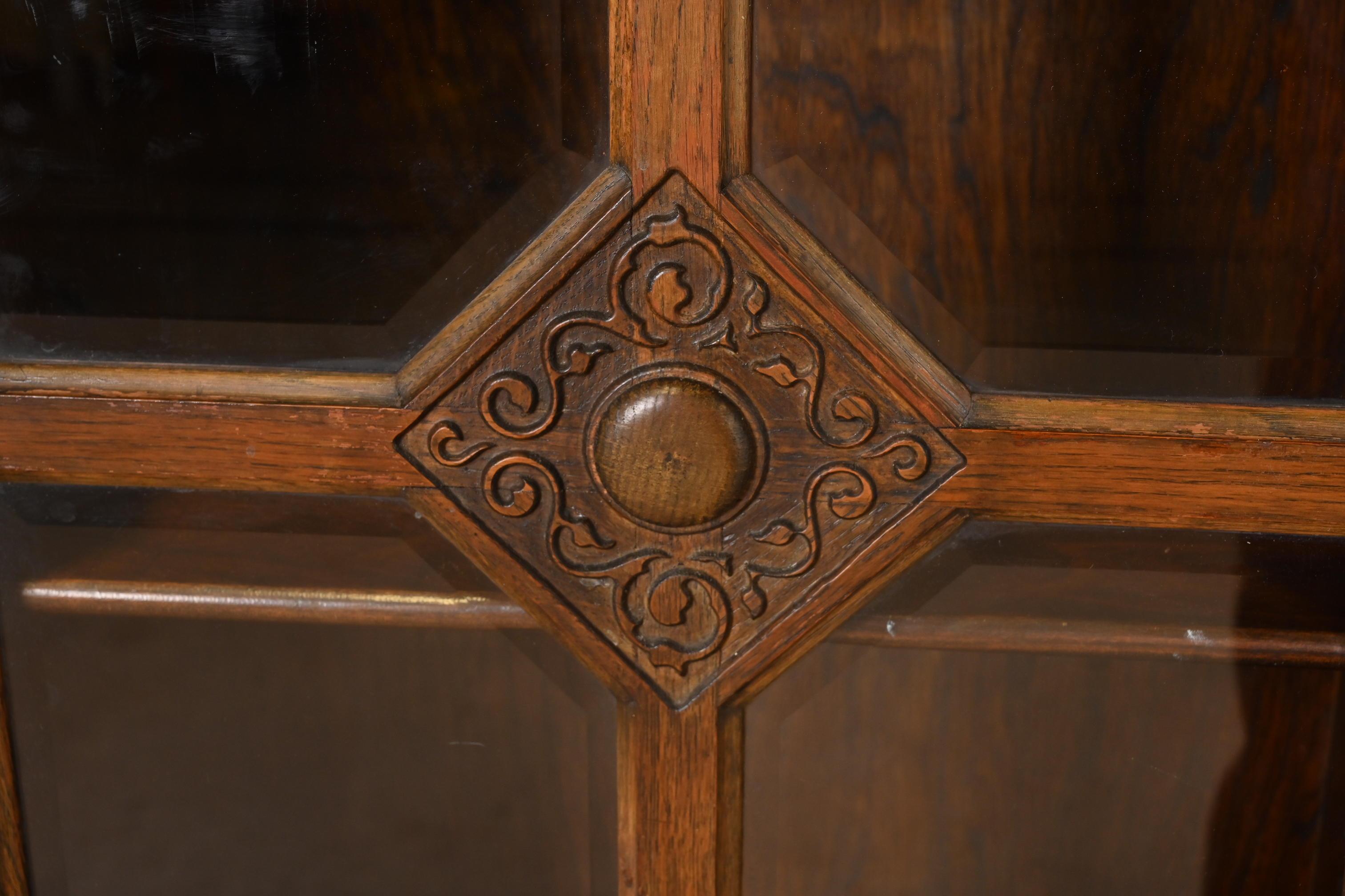 Brass R. J. Horner Style Antique English Tudor Carved Oak Glass Front Double Bookcase