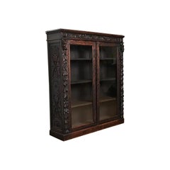 R. J. Horner Style Antique Victorian Carved Oak Bookcase Cabinet, Circa 1880s R. J. Horner Style Antique Victorian Carved Oak Bookcase Cabinet, Circa 1880s