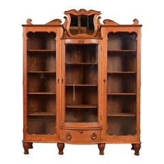 R. J. Horner Style Antique Victorian Carved Oak Triple Bookcase, Circa 1880s