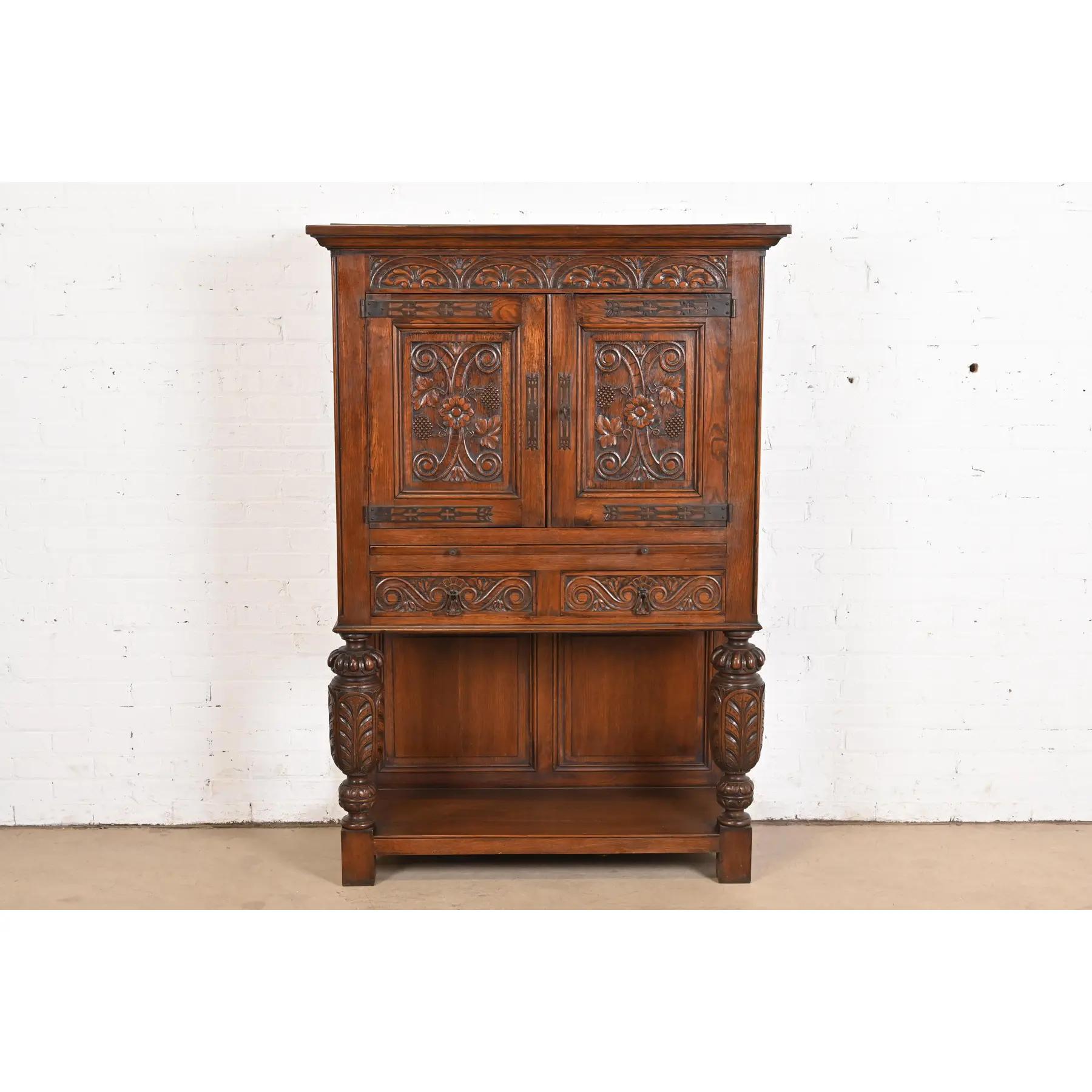 Victorian R. J. Horner Style English Jacobean Carved Oak Bar Cabinet, Circa 1900 For Sale