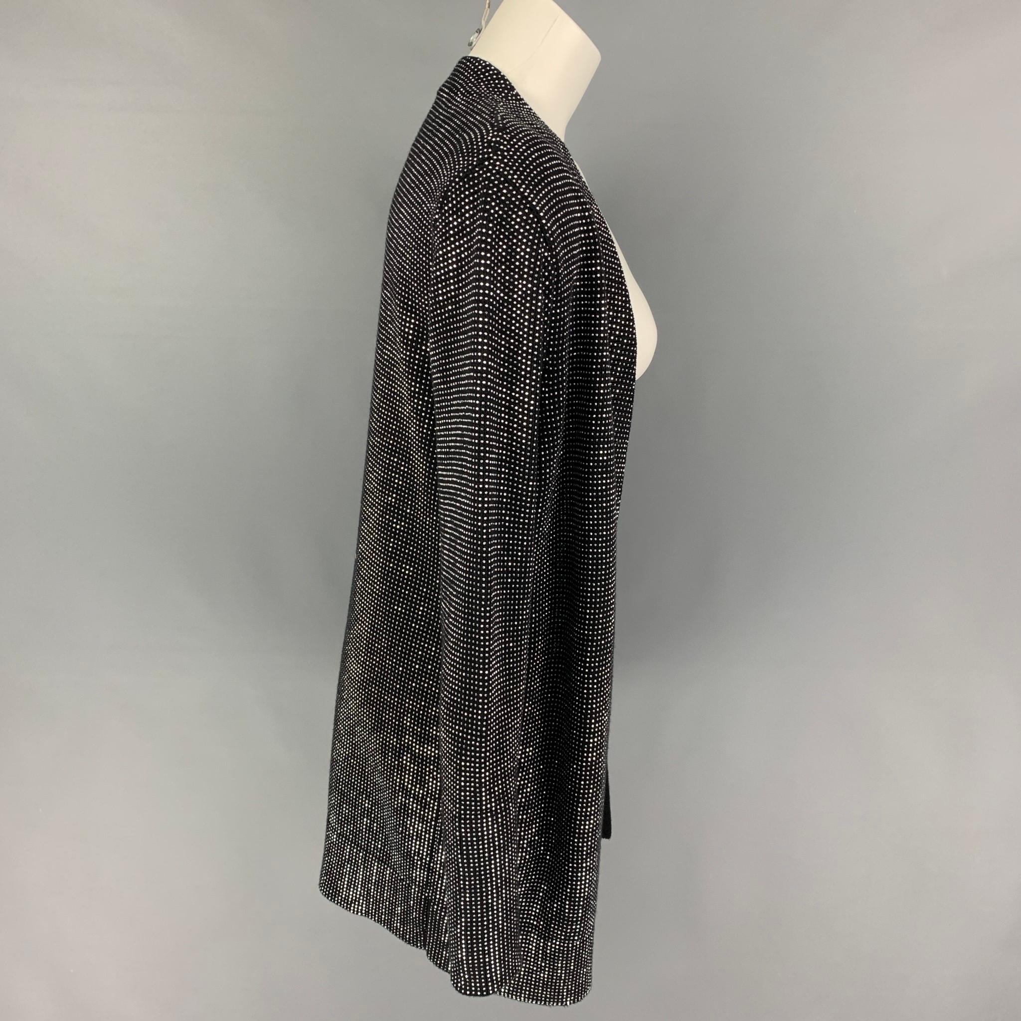 RtA cardigan comes in a black cotton with a studded design throughout featuring slit pockets and a open front. 

Excellent Pre-Owned Condition.
Marked: S

Measurements:

Shoulder: 16 in.
Bust: 36 in.
Sleeve: 27.5 in.
Length: 32 in. 