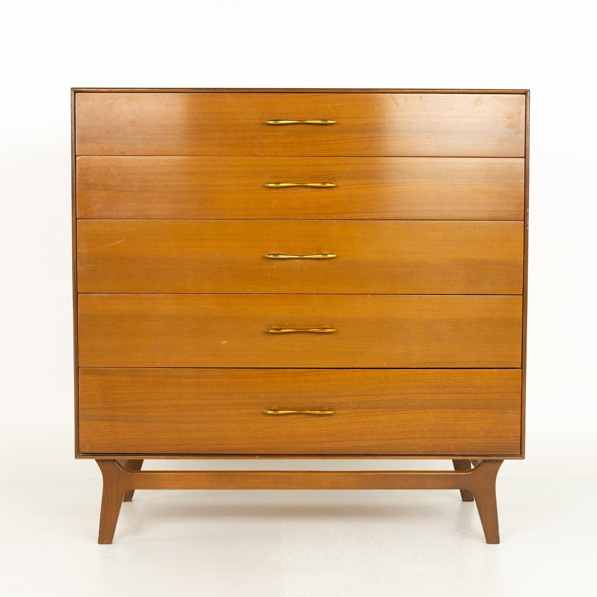 Rway Mid Century 5 Drawer Walnut and Brass Highboy Dresser

This dresser measures: 40 wide x 18.5 deep x 41 inches high

?All pieces of furniture can be had in what we call restored vintage condition. That means the piece is restored upon purchase