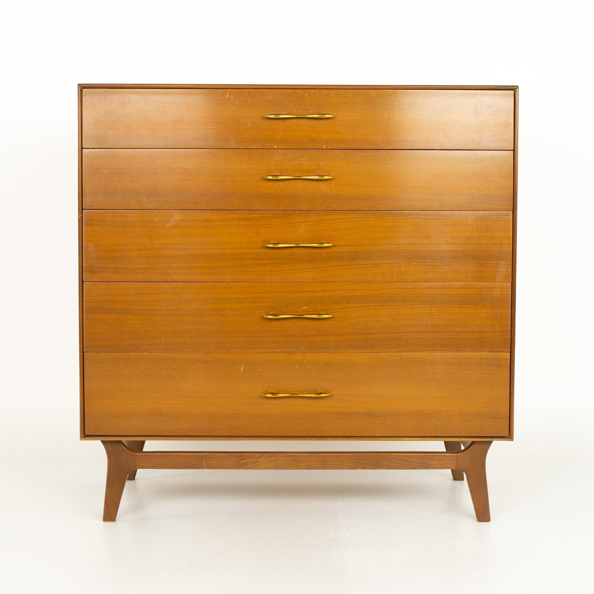 Rway Mid Century 5 Drawer Walnut and Brass Highboy Dresser

This dresser measures: 40 wide x 19.25 deep x 40.5 inches high

?All pieces of furniture can be had in what we call restored vintage condition. That means the piece is restored upon