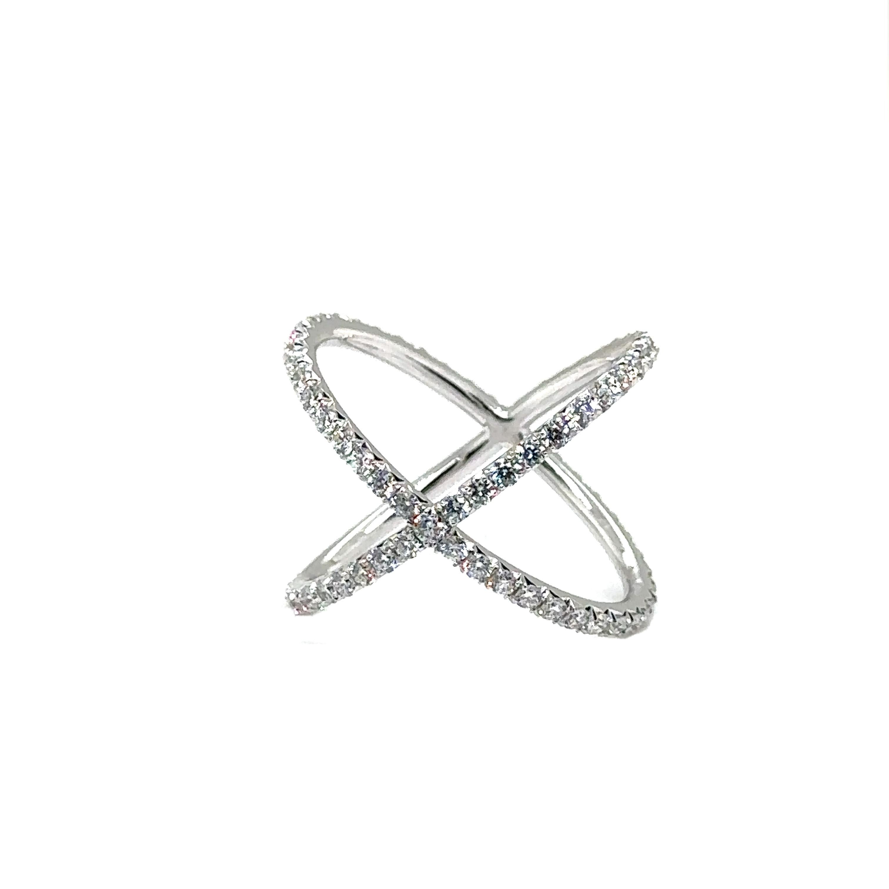 18K WHITE GOLD X RING with DIAMONDS 
Metal: 18K WHITE GOLD
Diamond Info: 
82-H/SI ROUND BRILLIANT DIAMONDS
SET IN MICRO PAVE FISH TAIL TWO BEADS 
Total Ct Weight:  1.19 cwt.
Item Weight: 3.18 gm
Ring Size: 6 ¼ (Not Re-sizable)
Measurements: 16.30 mm
