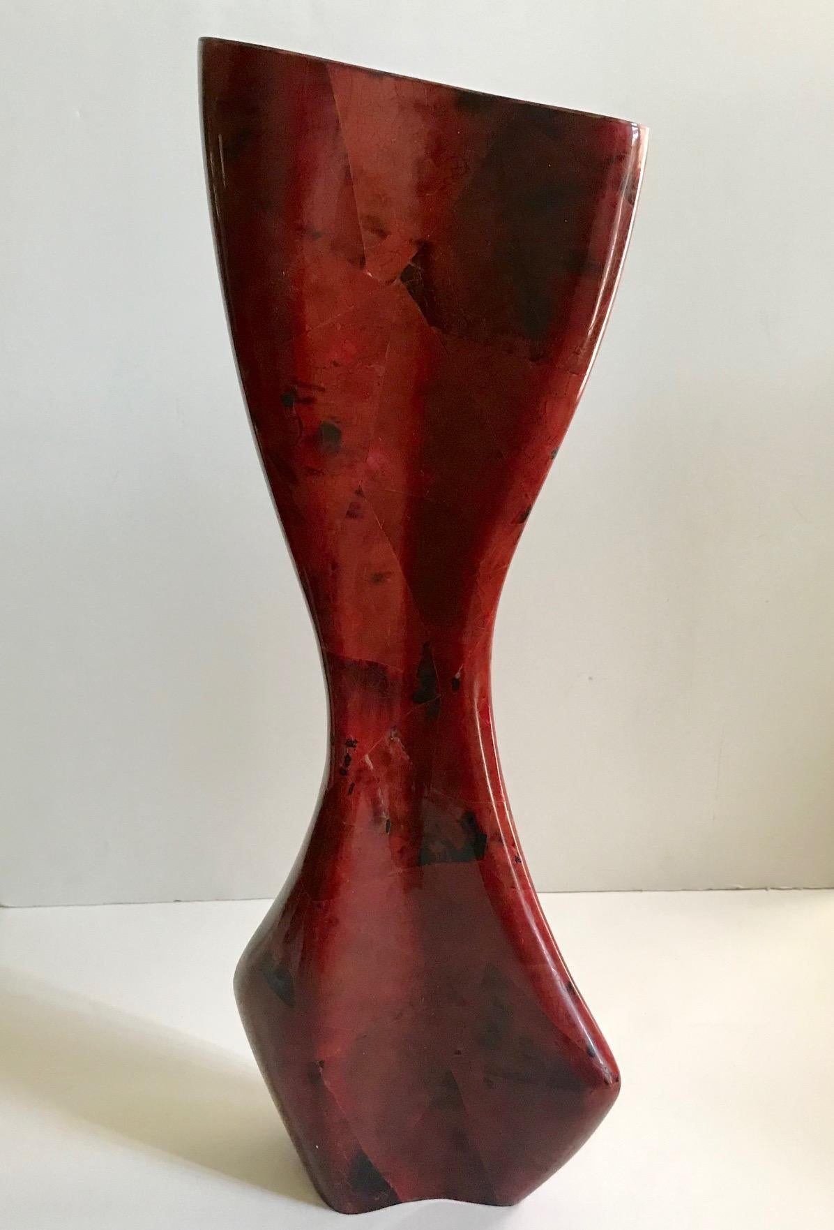 Exceptional organic modern vase with sculptural abstract form. Handcrafted from exotic materials featuring lacquered pen-shell inlays with geometric patterns in red and black. Comprised of pen-shell over palm wood and stamped with R & Y signature.