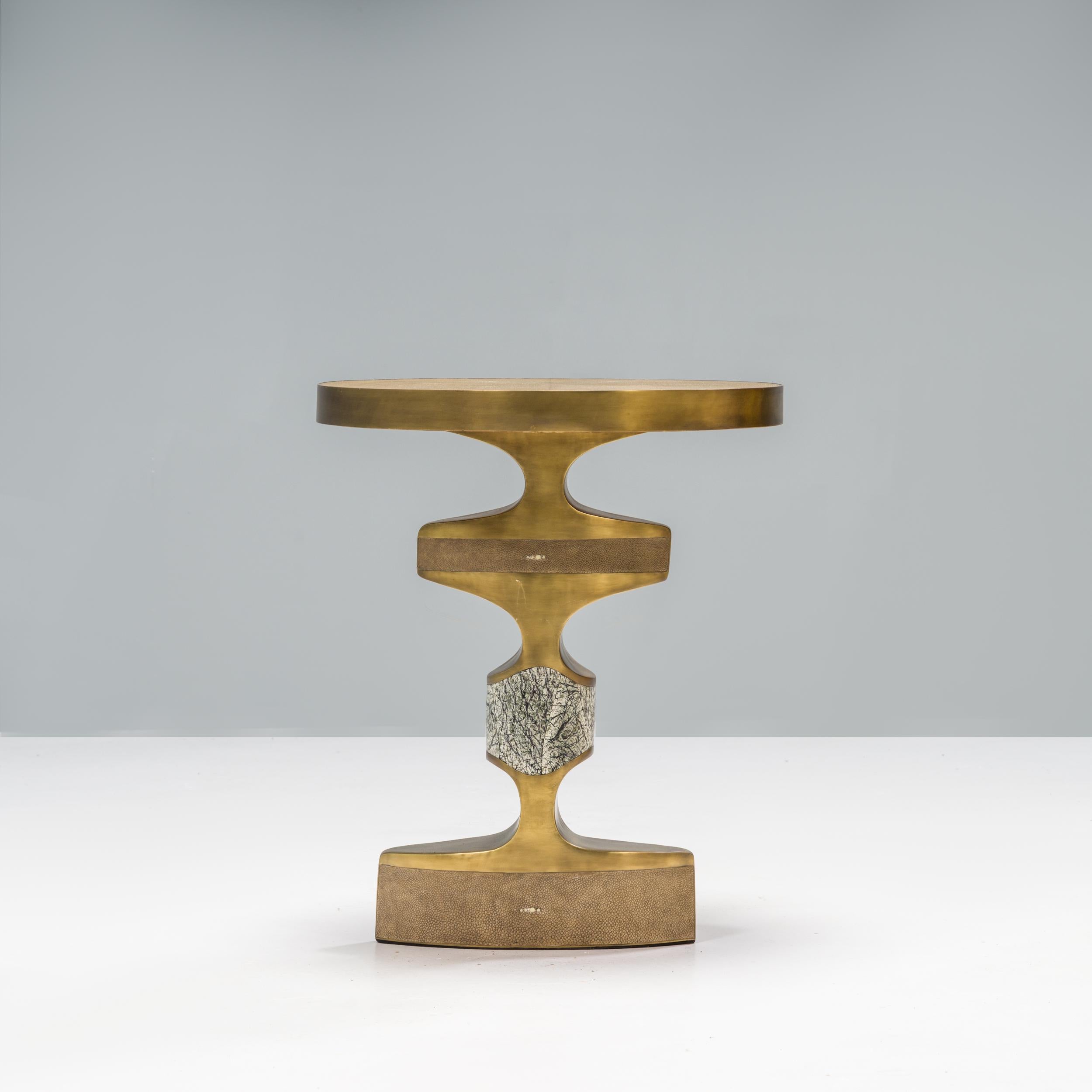 Ria & Yiouri Augousti founded their Parisian design company in 1989, inspired by the Art Deco period and the exotic materials often used in design during that period.

Handmade by skilled artisans in the Philippines, the Carmen side table has a