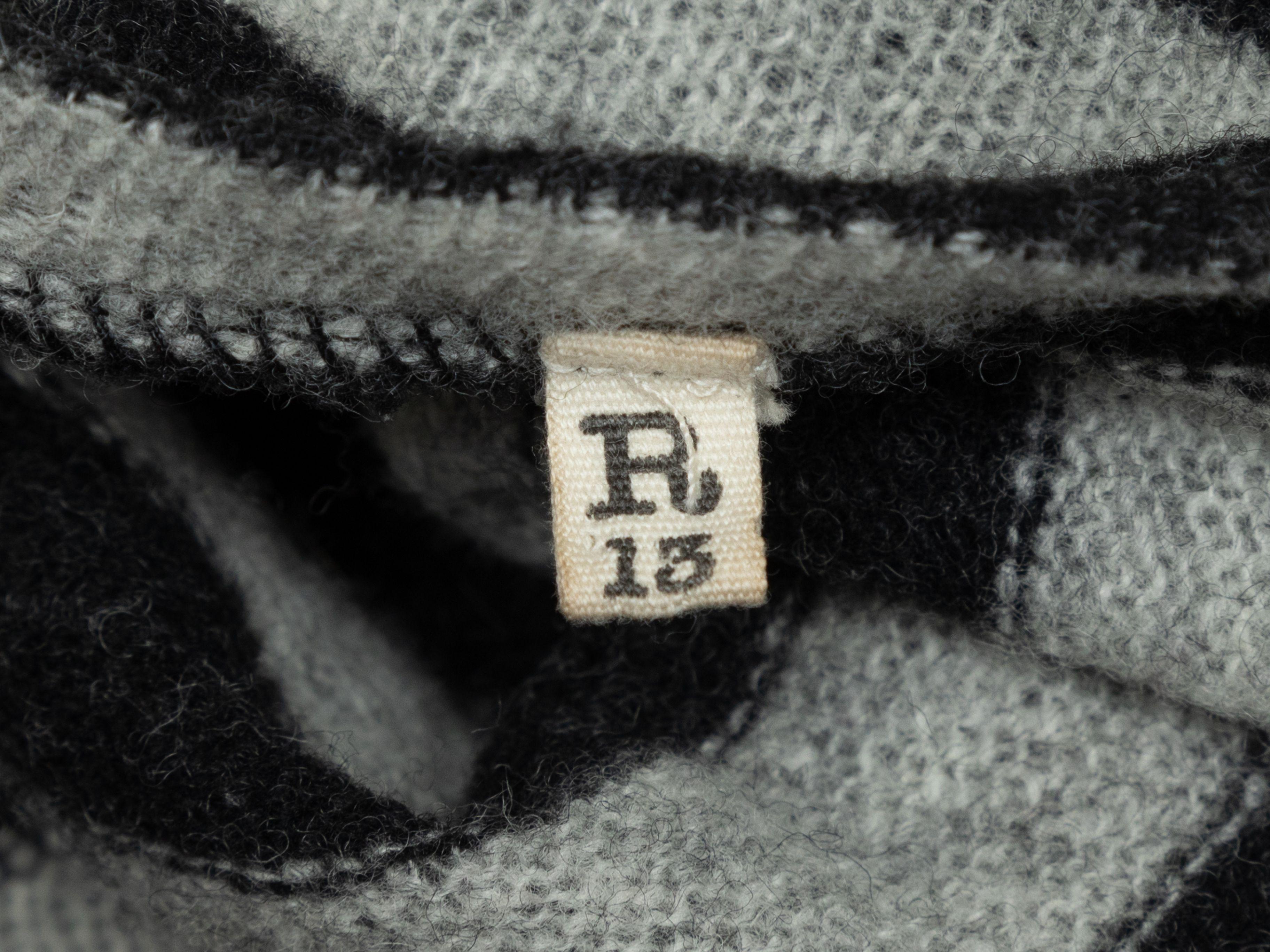 Product Details: Black and grey distressed striped wool sweater by R13. Crew neck. Long sleeves. 40