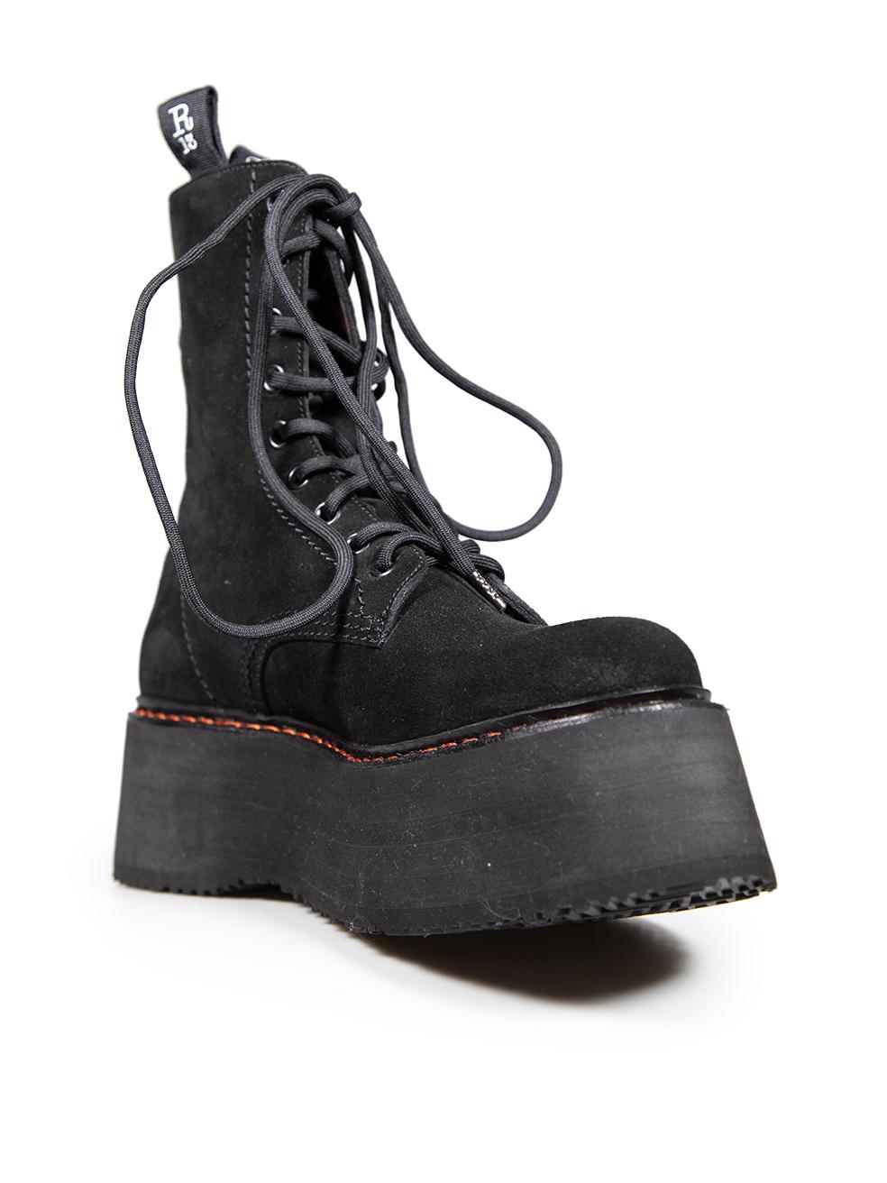 CONDITION is Very good. Minimal wear to the boots is evident. Abrasion to the left side of the right shoe and the right side of the left shoe. One mark on the front of the left shoe towards the eyelets on this used R13 designer resale item.
  
  
 