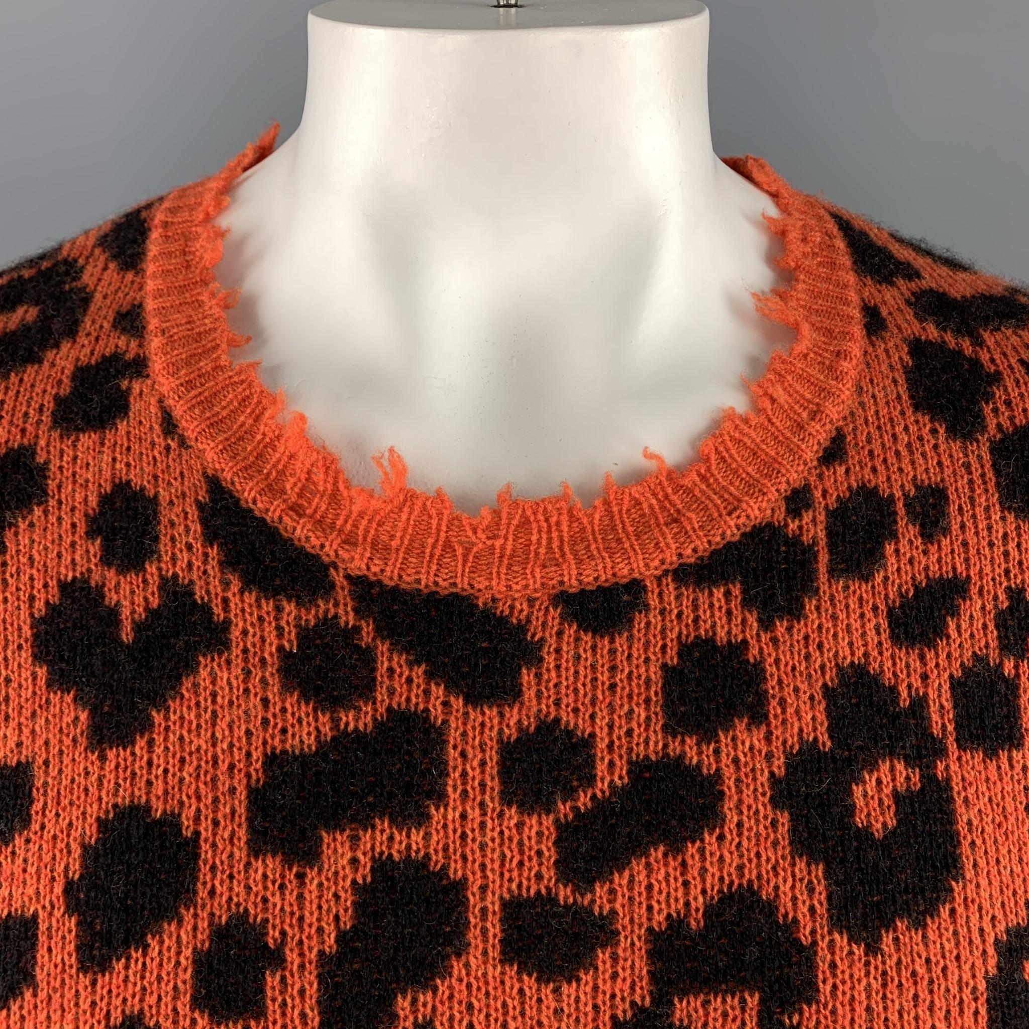 R13 pullover sweater comes in orange and black leopard print cashmere with a scoop neck and distressed hems. 

New with Tags. 
Marked: L

Measurements:

Shoulder: 21 in.
Chest: 52 in.
Sleeve: 31 in.
Length: 30.5 in.