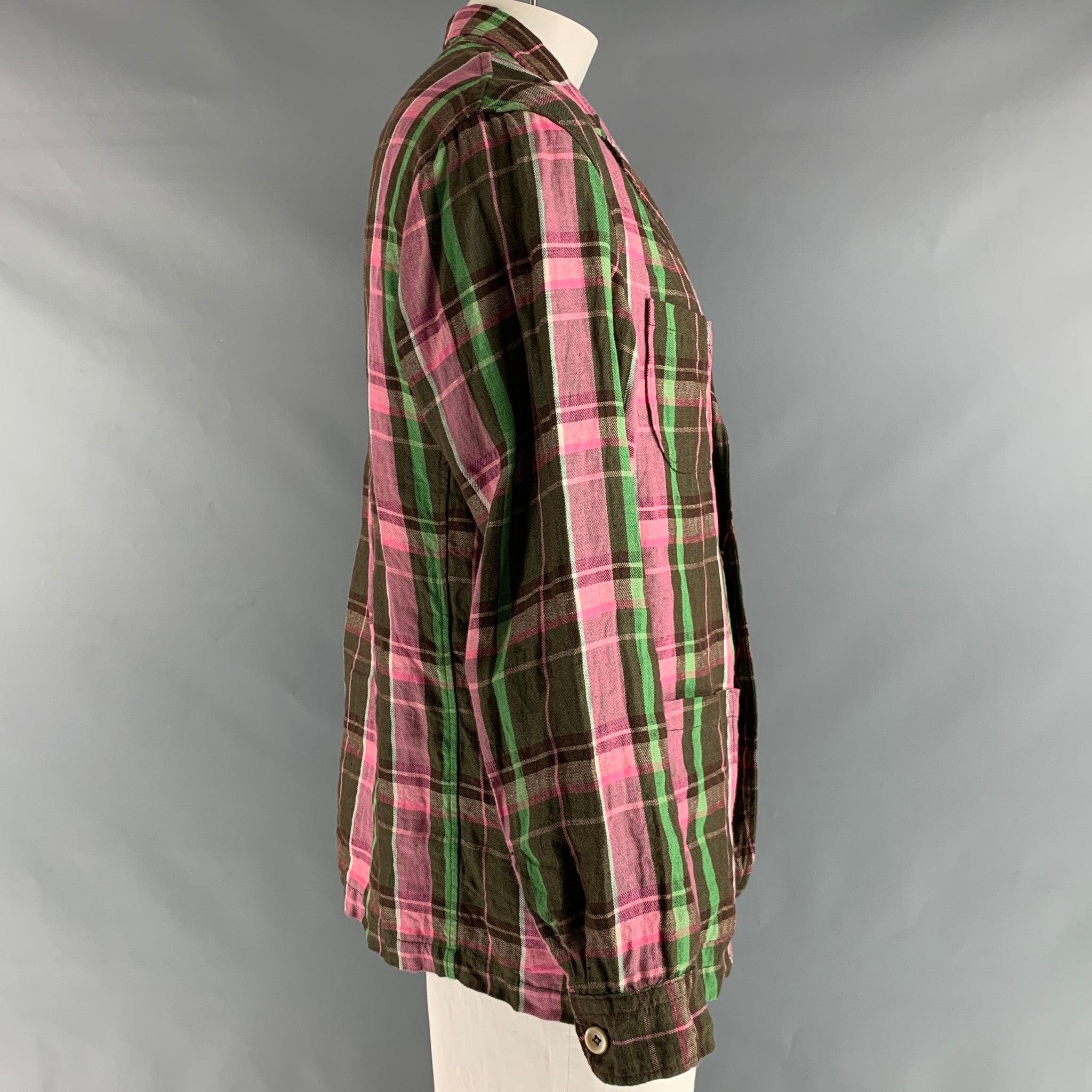 R13 jacket comes in a brown, pink and olive plaid linen woven material featuring a notch lapel, four patch pockets, and a button closure.Excellent Pre-Owned Condition. 

Marked:   04 

Measurements: 
 
Shoulder: 20 inches Chest: 45 inches Sleeve: 25