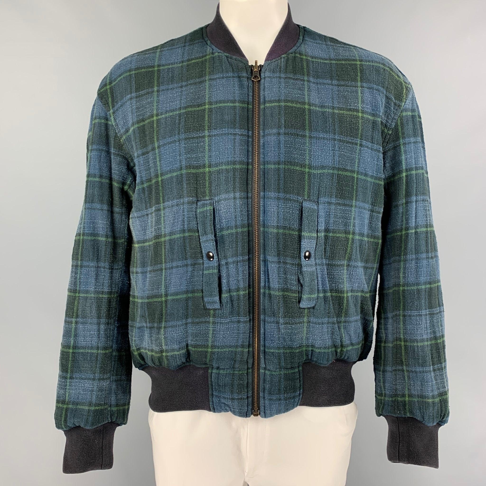 R13 jacket in a orange & black plaid cotton featuring a reversible style, oversized, bomber, ribbed hem, front pockets, and a full zip up closure. Made from Japanese fabric.Very Good Pre-Owned Condition. 

Marked:   M 

Measurements: 
 
Shoulder: