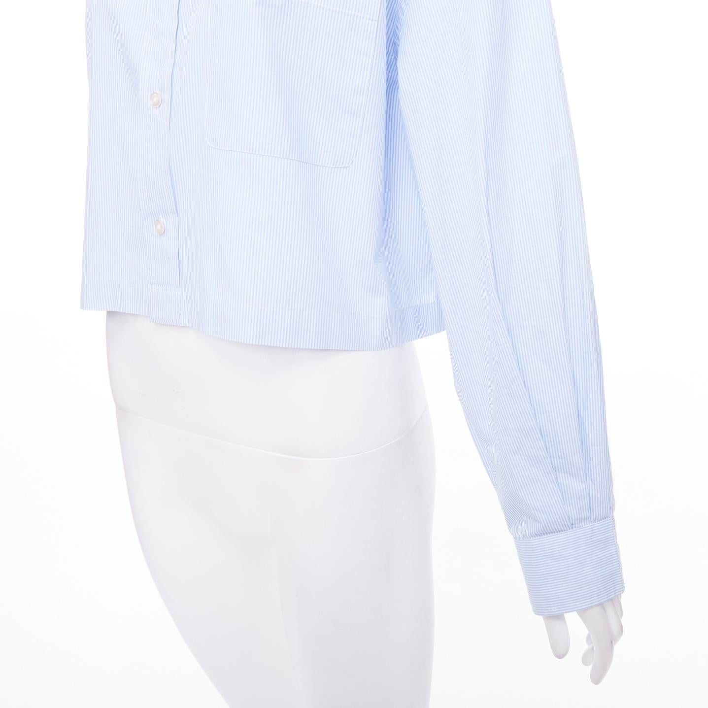 R13 SW light blue white stripe oversized cropped button up shirt S
Reference: NKLL/A00293
Brand: R13
Model: SW
Material: Cotton
Color: Blue, White
Pattern: Striped
Closure: Button
Made in: China

CONDITION:
Condition: Very good, this item was
