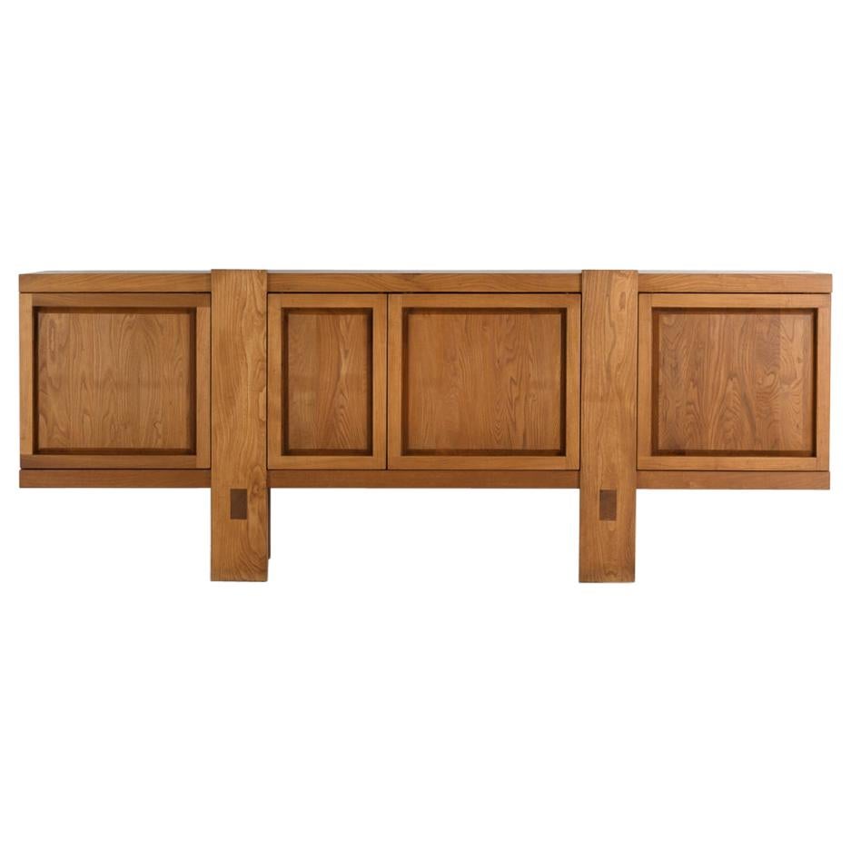 R16 bahut credenza by Pierre Chapo, France 
This credenza was designed in 1965 and is a real masterpiece of woodworking.
The weight of this piece is around 250kg. All built solid and very sturdy.
It can be ordered in oak or elm wood.