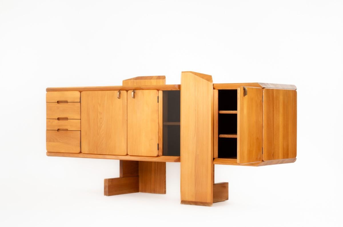 Very RARE model !
Designed by Pierre Chapo in the 80s, model R28
All in elm
2 feet, drawers in the left part, doors with storage in the middle and right part
Amazing patina of the wood