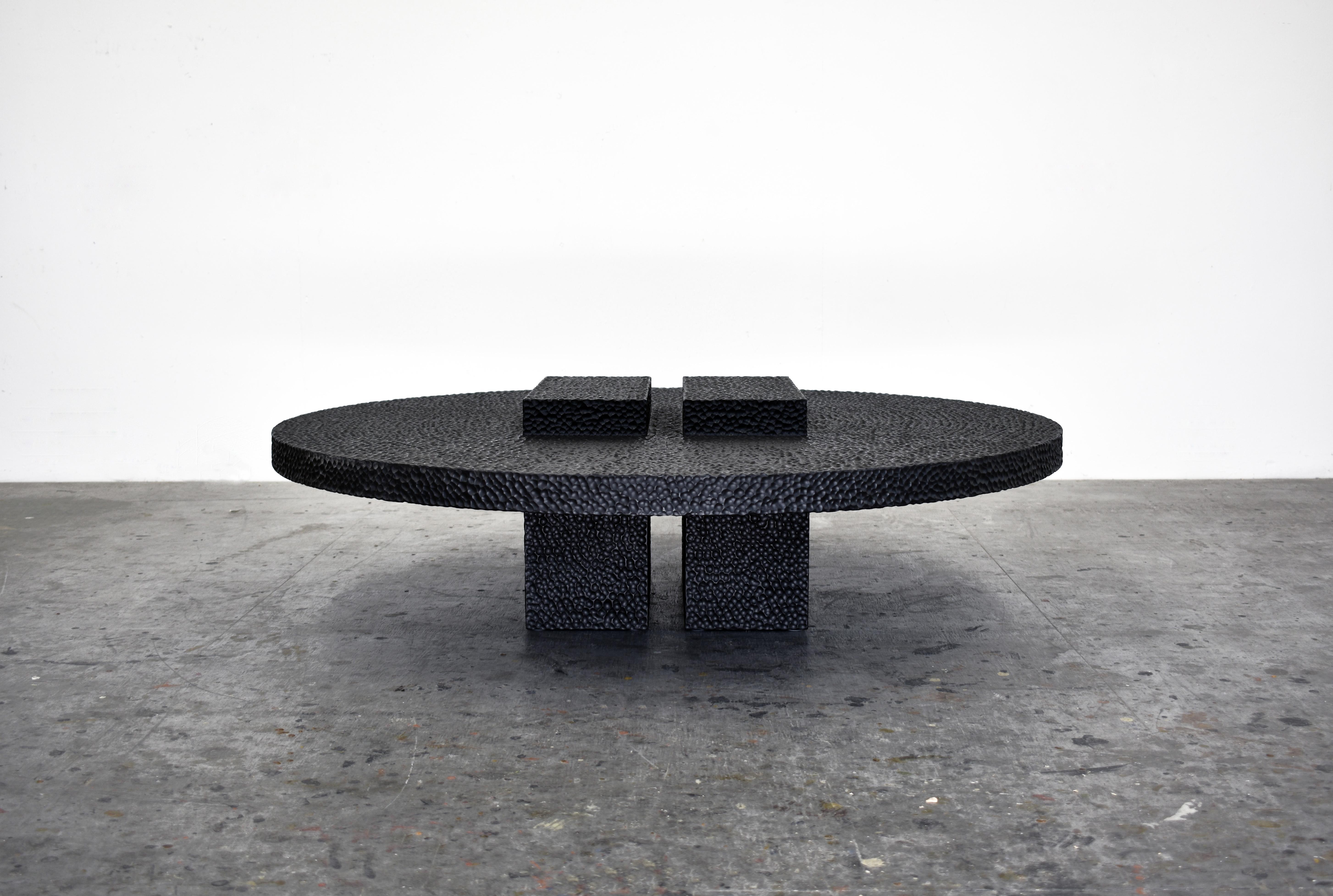 R3 maple round low table sculpted by John Eric Byers
Dimensions: 33 x diameter 122 cm
Materials: Carved blackened maple

All works are individually handmade to order.

John Eric Byers creates geometrically inspired pieces that are minimal,