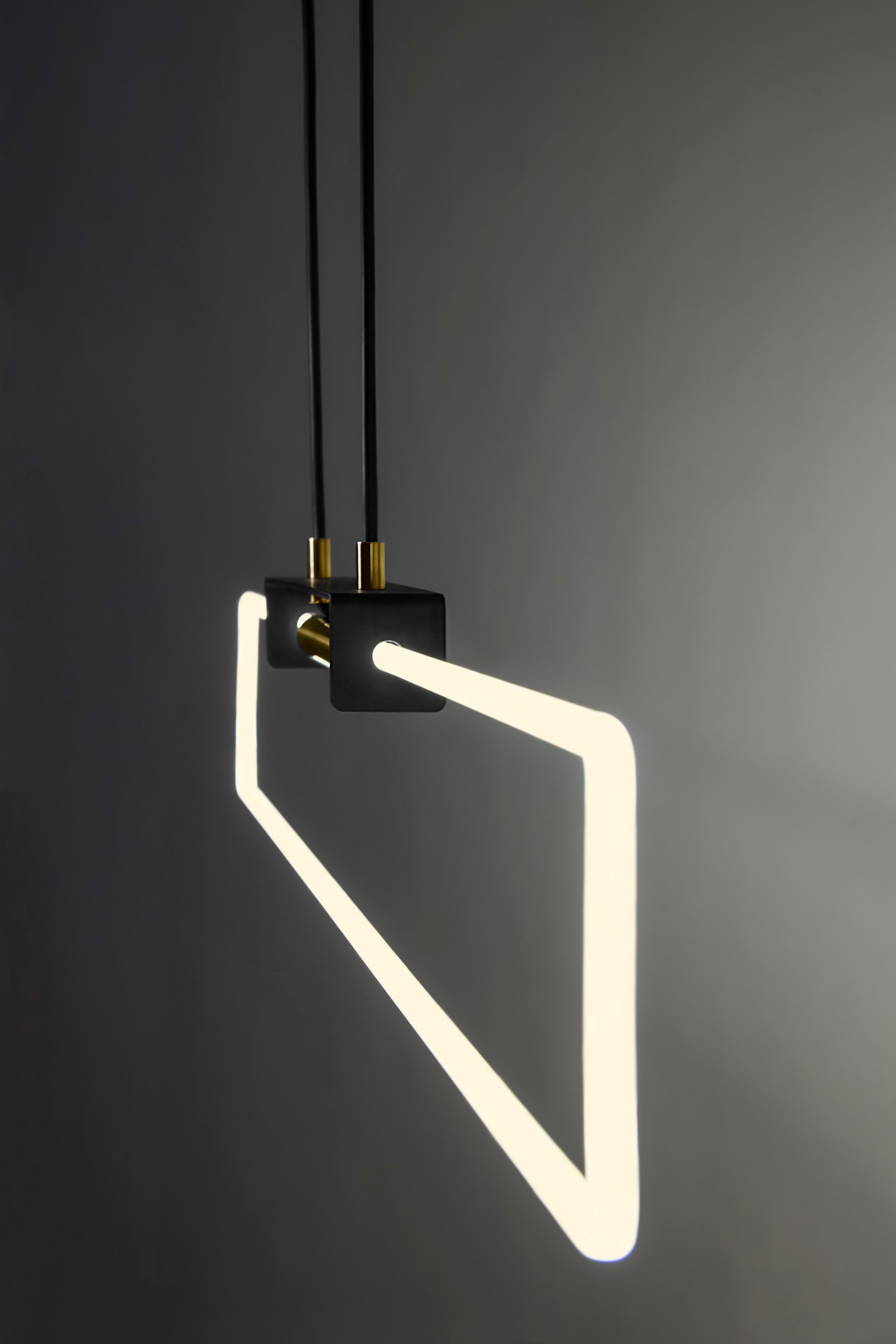 The Ra Suspension is a modern high-end lighting pendant with clean, crisp lines made with a cold cathode neon bent manually.

Neon has long evoked images of harsh, white commercial lighting or bright, coloured flashy signs in the dark. D’Armes