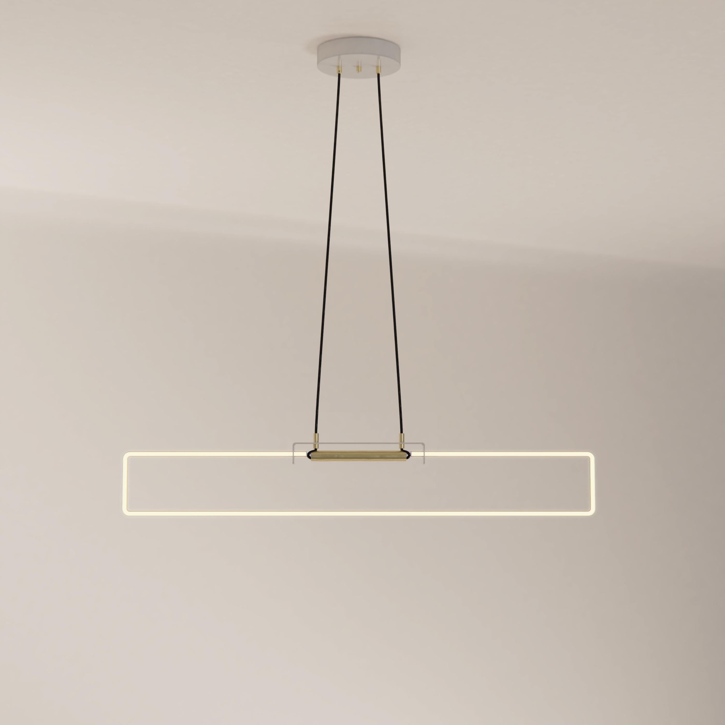 The Ra Suspension is a modern high-end lighting pendant with clean, crisp lines made with a cold cathode neon bent manually.

Neon has long evoked images of harsh, white commercial lighting or bright, coloured flashy signs in the dark. D’Armes
