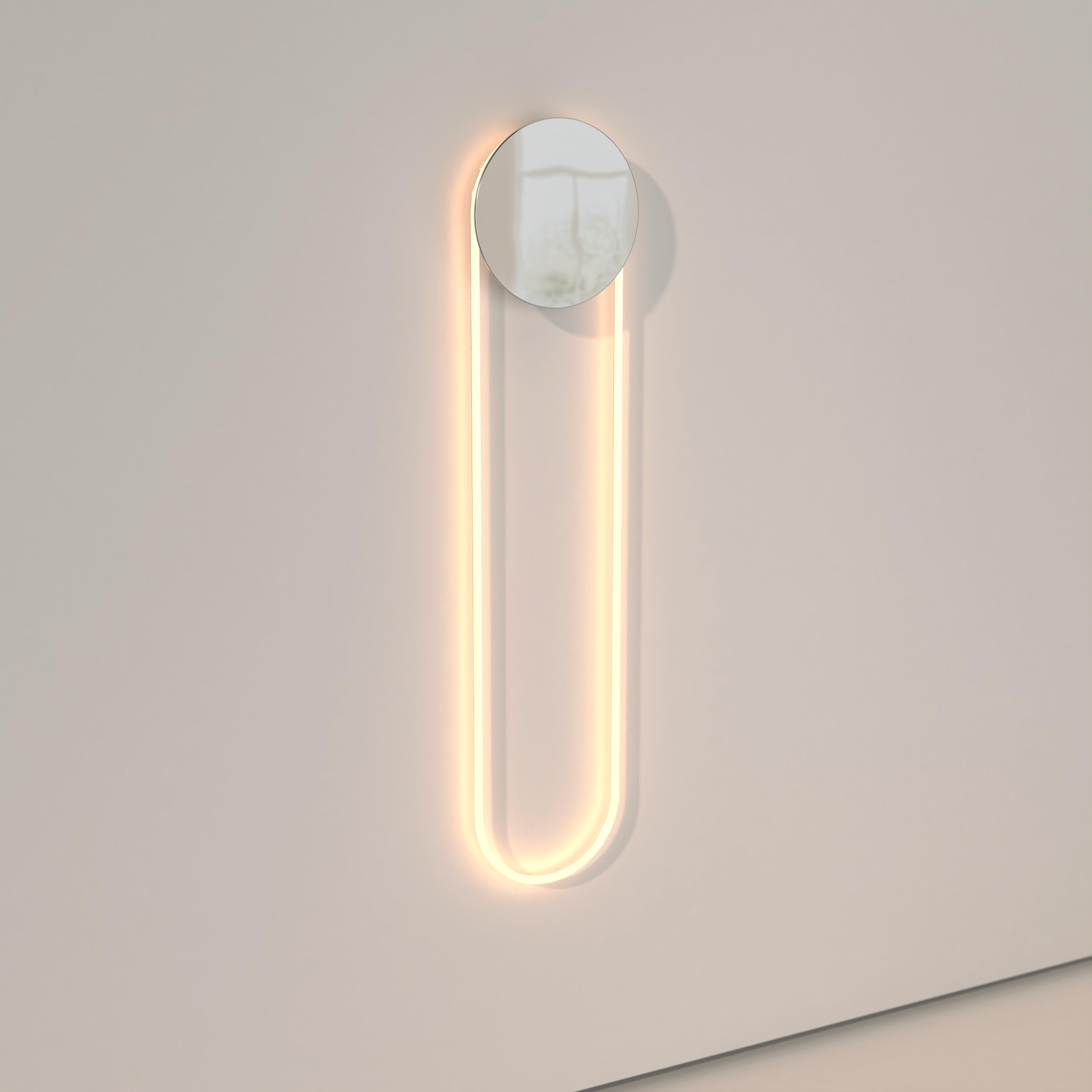 The Ra Wall is a modern and hypnotic wall sconce lighting made with a cold cathode neon and a circular disc available in diverse finishes.

RA Wall participates in its surroundings by playing with contrasts, shadows and reflections. The circular