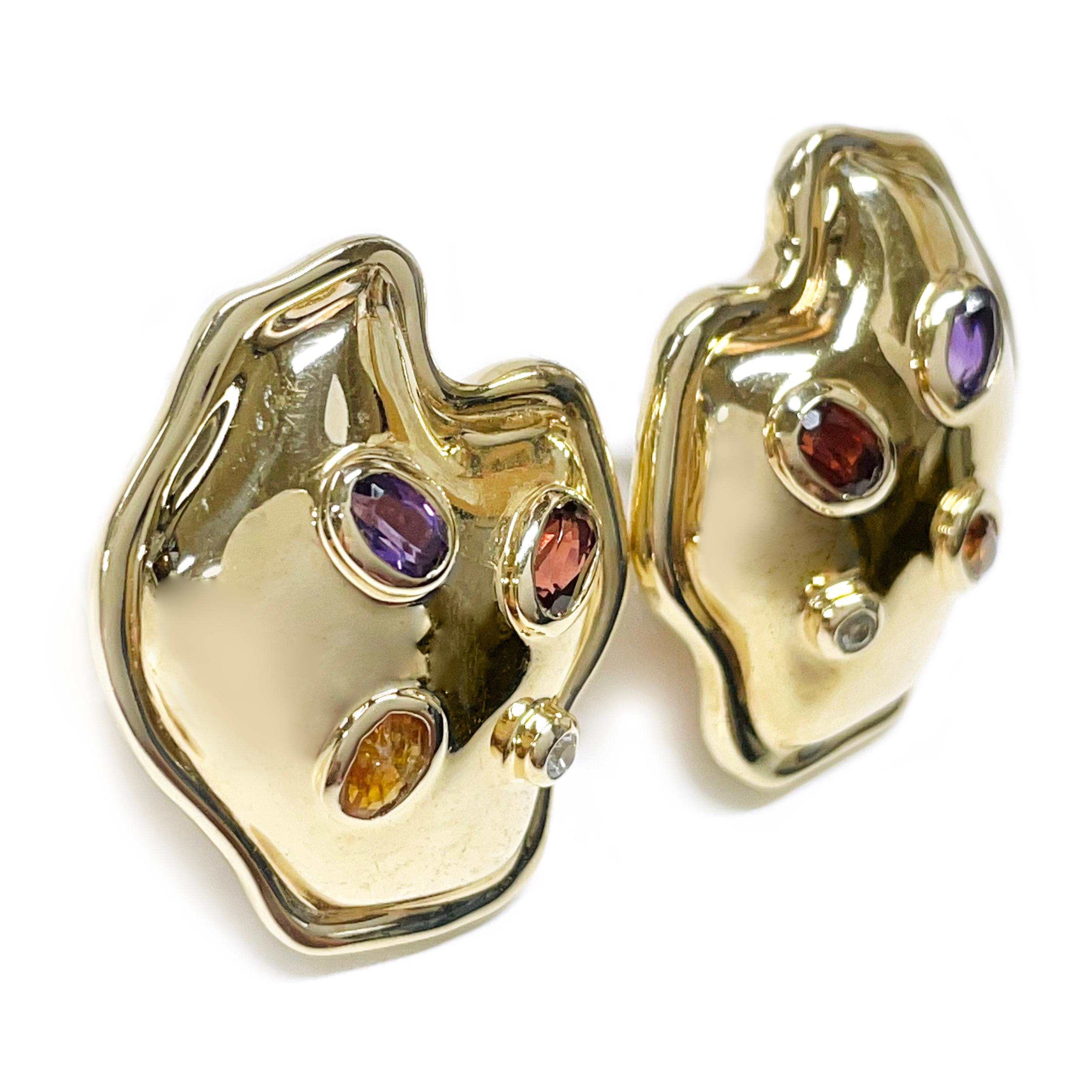 Raafty 14 Karat Yellow Gold Yellow Gold Amethyst Garnet Citrine Topaz Earrings. The earrings have an organic shape and four bezel-set gemstones on each earring. Stamped on the back of the earrings is the maker's mark Raafty and 14K. The earrings