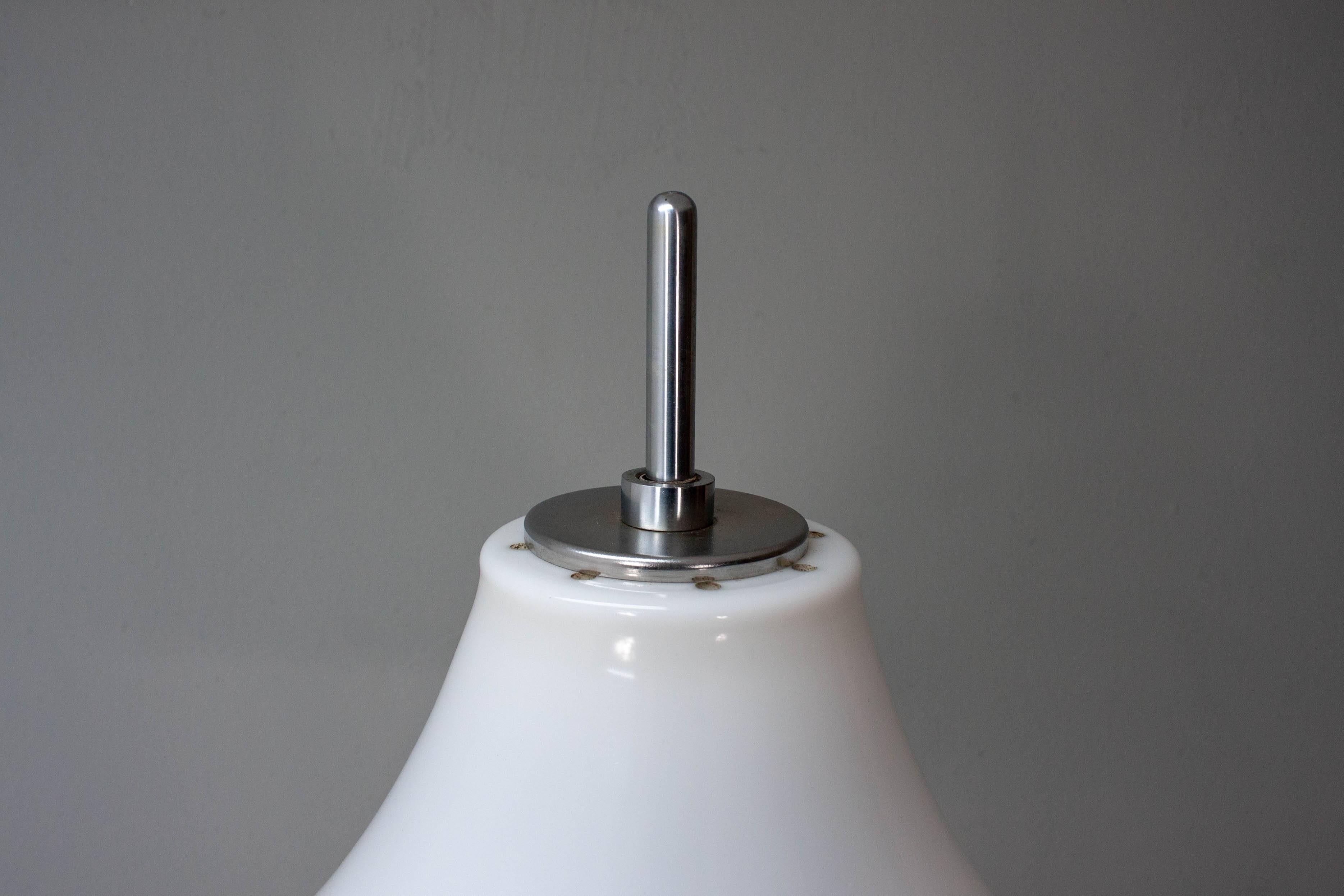 Stylish height-adjustable floor lamp from Gepo, Amsterdam  1970s. The lampshade/armature assembly slides up and down a central post (it can go all the way to the floor if desired). Original Perspex shade and in overall very nice shape.