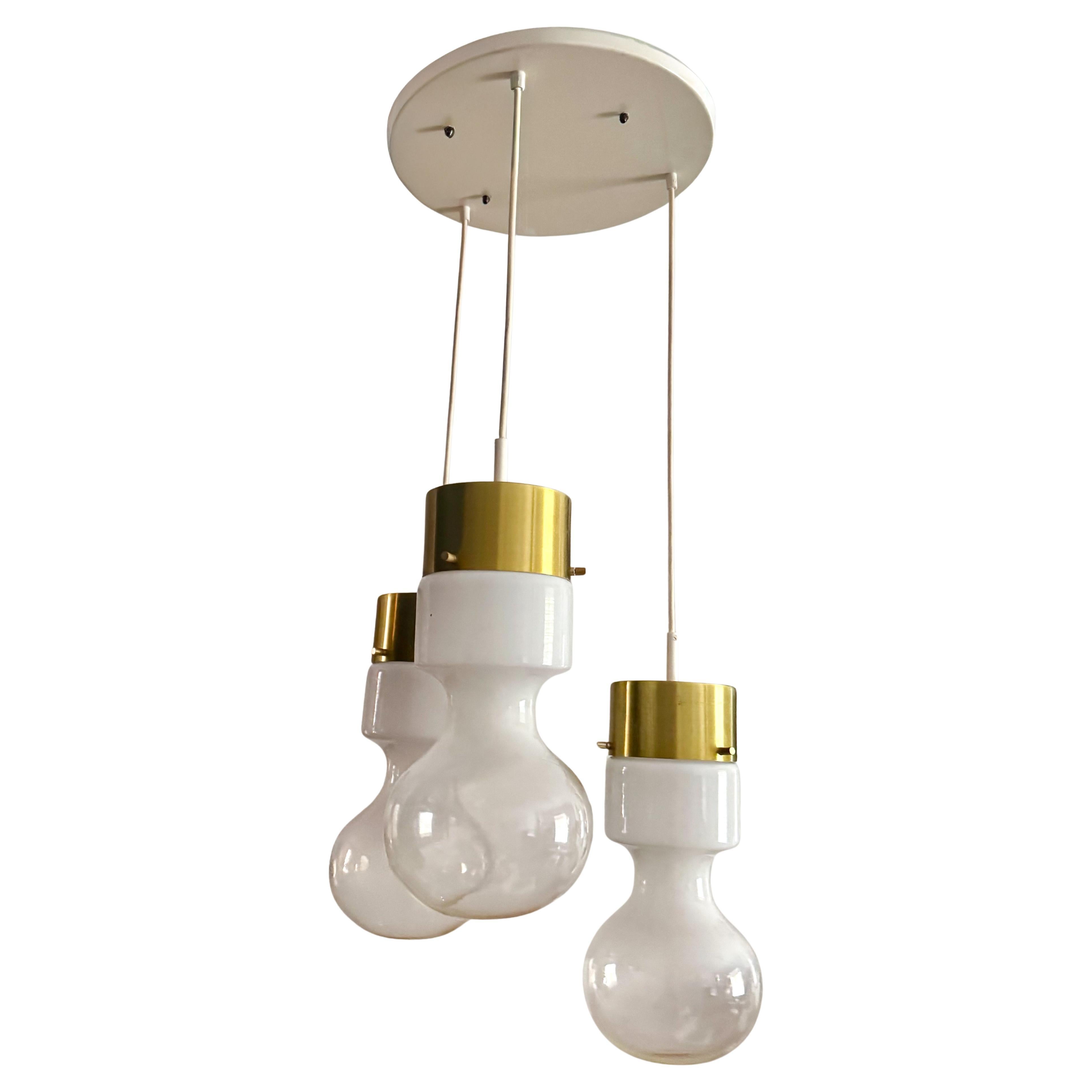 Lustre "Weerballon" de RAAK Amsterdam, ensemble de 3 pendentifs, 1970 MId Century en vente