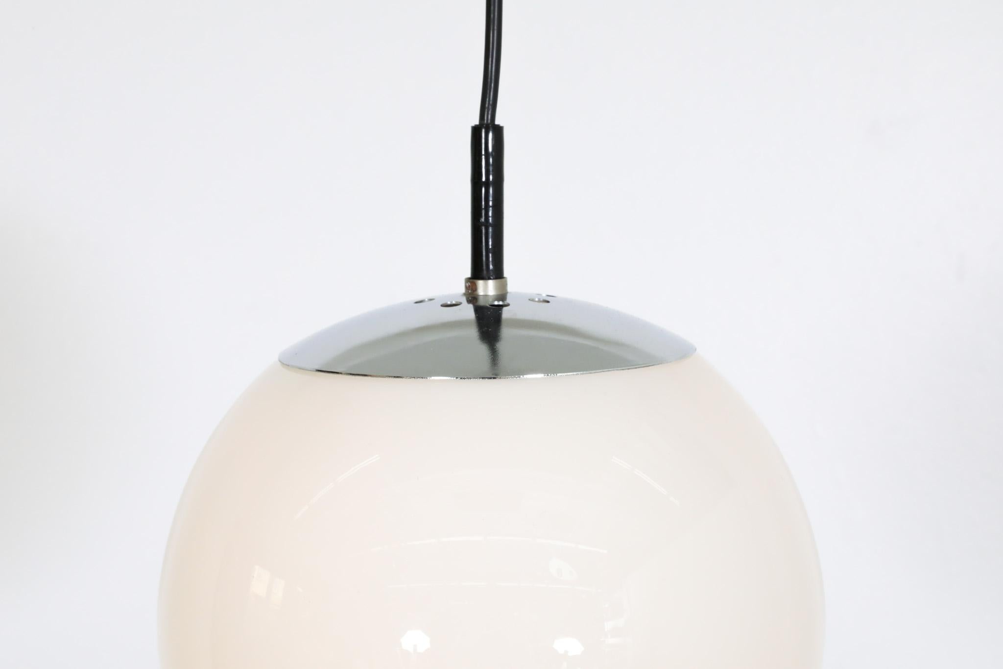 RAAK (attr) Opaline Glass Globe Pendant Lights with chrome hardware For Sale 3