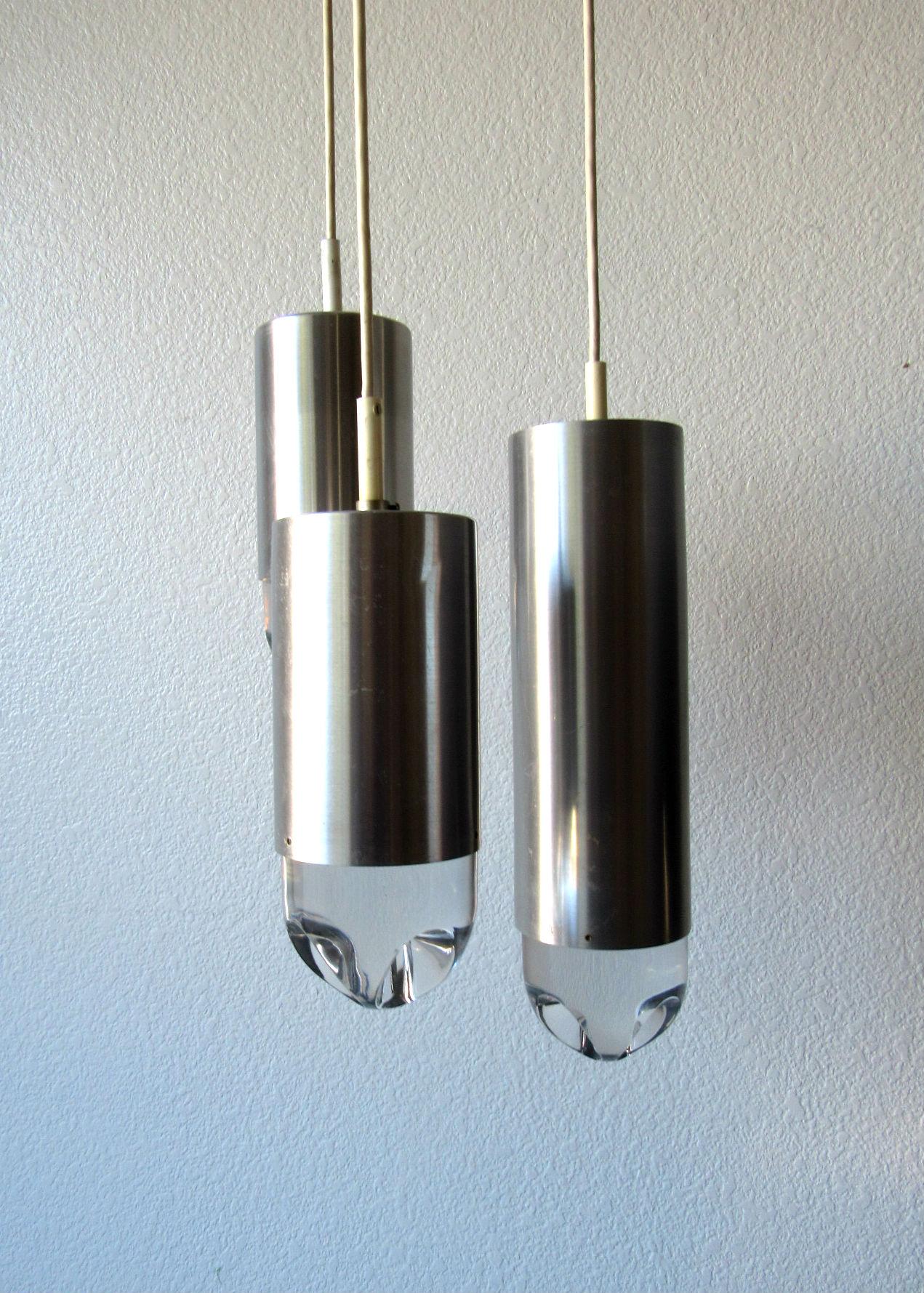 RAAK brushed aluminum and crystal glass chandelier made in the Netherlands, circa 1960s. Retains original canopy and cords as well as original RAAK label. 

 