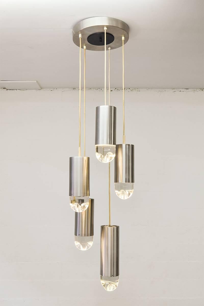 Very decorative chandelier made by RAAk in the Netherlands in the 1960s.
Made from brushed steel and crystal glass.