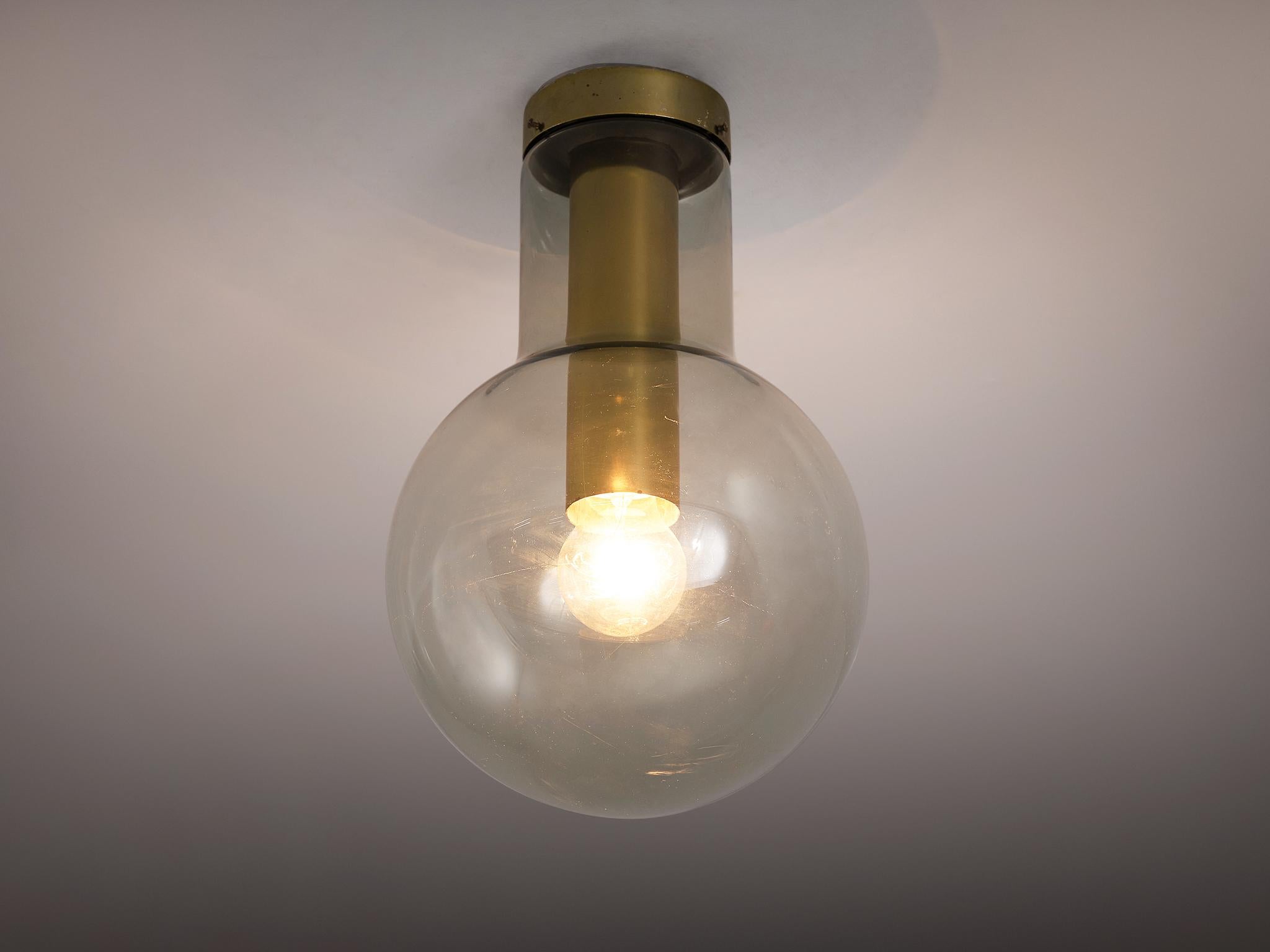 RAAK Amsterdam, ceiling light model 'Maxi-Light Bulb' B-1260, brass, smoked glass, The Netherlands, 1960s 

RAAK created an amusing lamp by building a light bulb around a light bulb. A distinctive design is created by implementing a notable