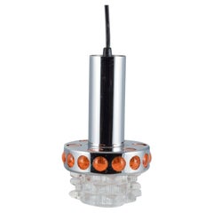 RAAK, Niederlande. Designer-Lampe aus Chrom, orangefarbenem Kunststoff und klarem Glas.