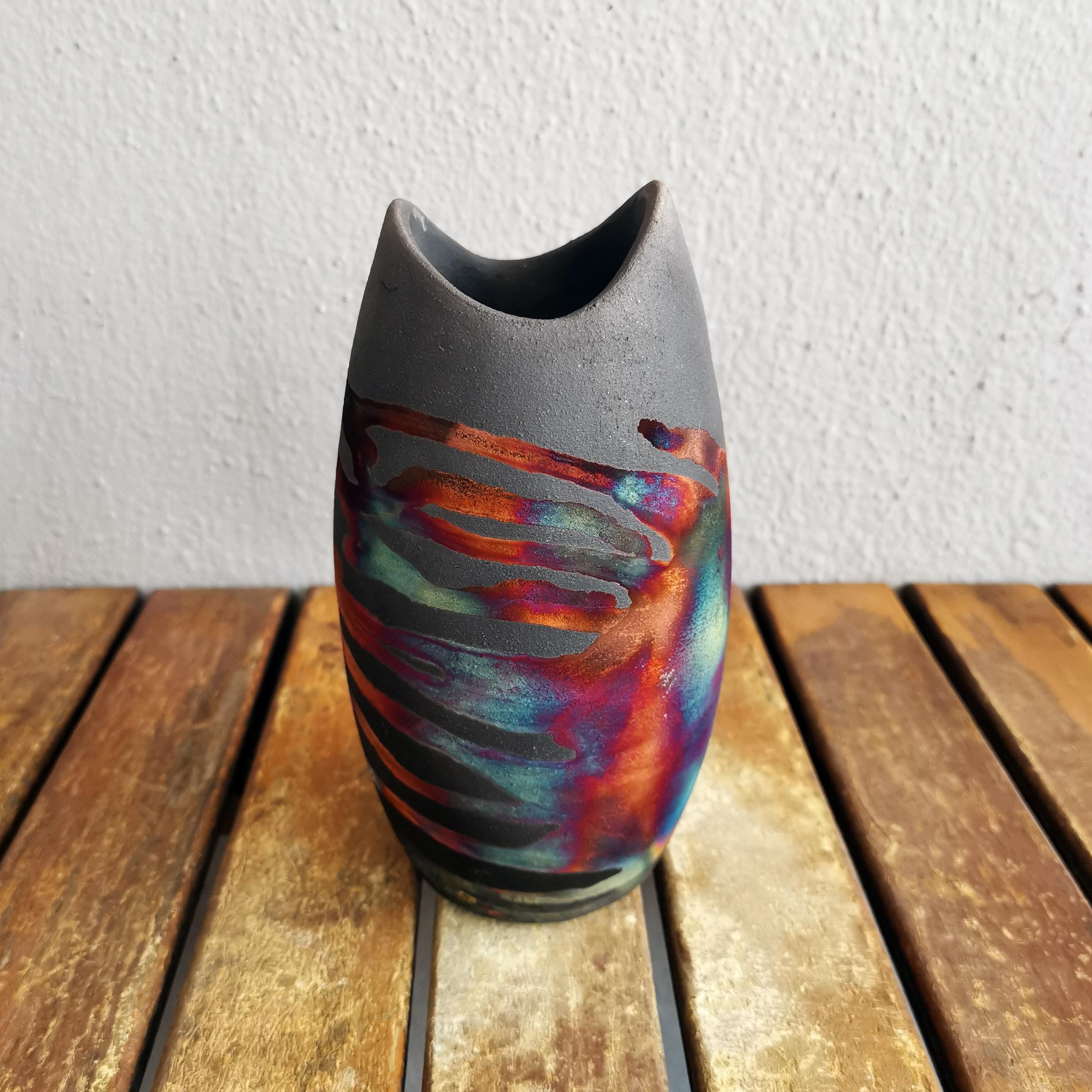 Koi (鯉 ) (n) carp

Our Koi vase is bottle-shaped with a wavy arched mouth which slightly resembles the mouth of a fish. Its eclectic design would blend in well in any interior décor style.

The Koi vase can be displayed on its own or used to hold