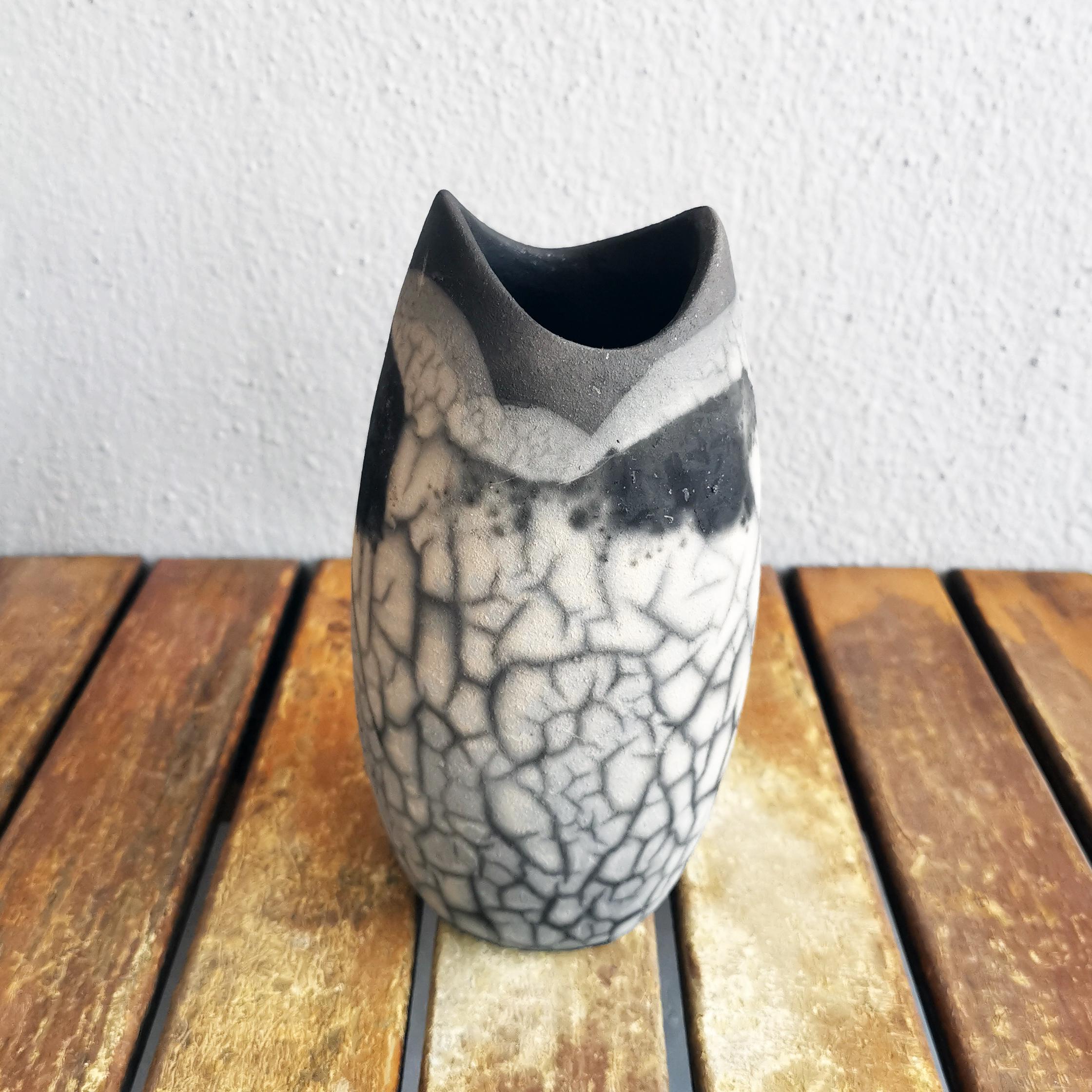 Koi (鯉 ) (n) carp

Our Koi vase is bottle-shaped with a wavy arched mouth which slightly resembles the mouth of a fish. Its eclectic design would blend in well in any interior décor style.

The Koi vase can be displayed on its own or used to hold