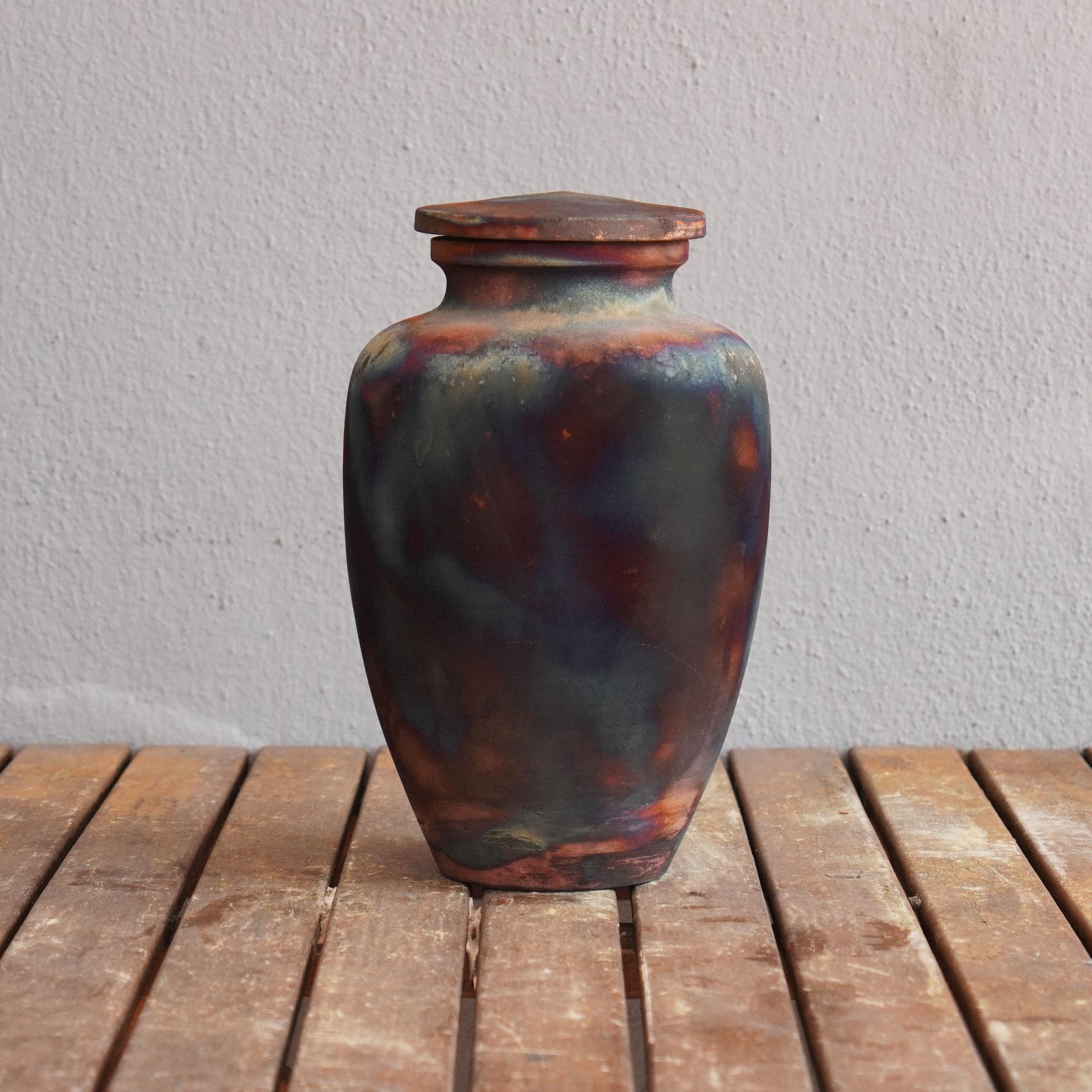 Omoide ~ (思い出) - Memories
 
 The passing of a loved one will always be a defining moment in a person's life. The Omoide Urn is a one of a kind ceramic art piece that offers a focal point to reminisce on the mememories left behind by your loved one.
