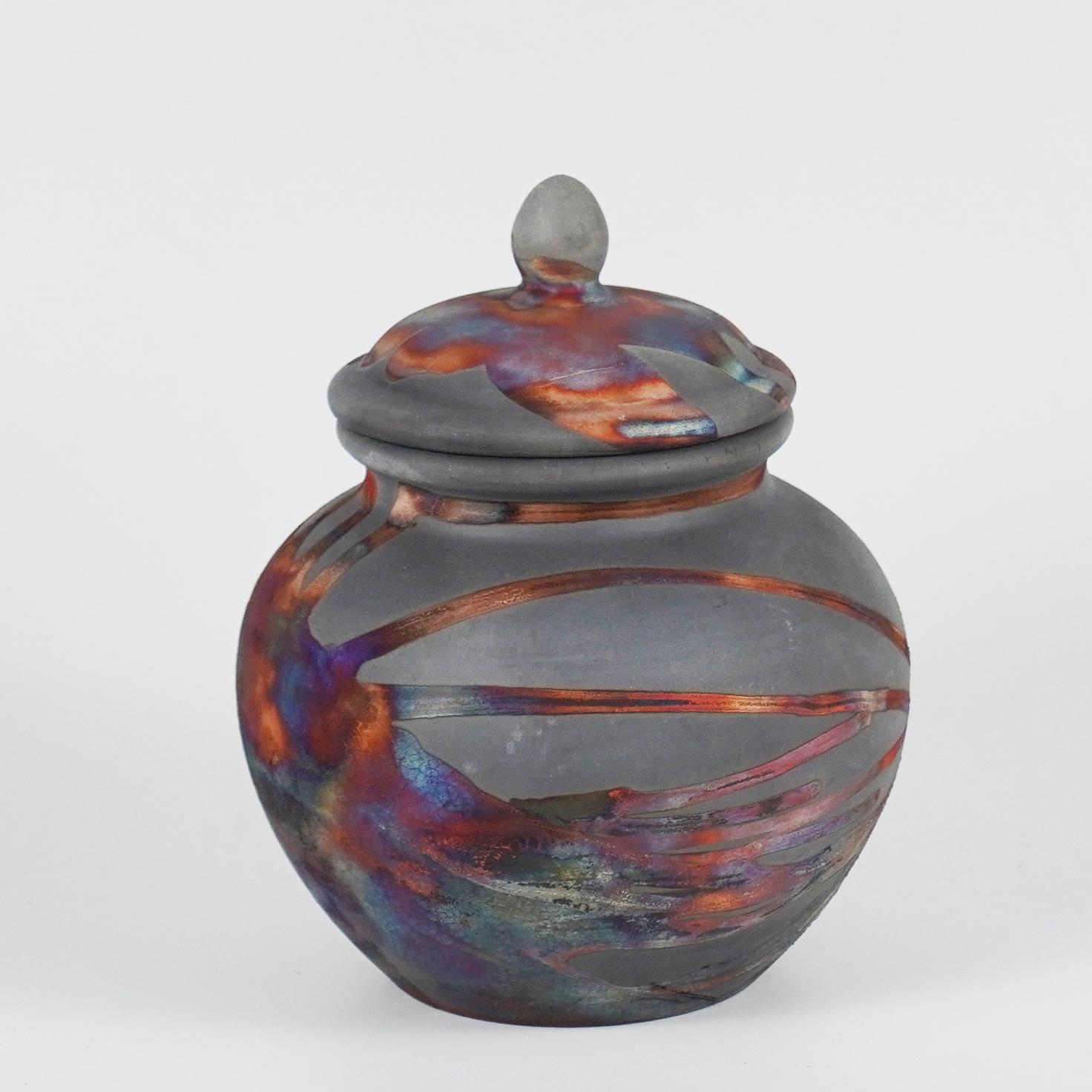 Tamashii Urn ~ 魂 (Soul)

The Tamashii Urn serves as a focal point of remembrance for a loved one that has passed from this life but not from your heart. This vessel is fired using the Raku technique where no two pieces are the same.

Capacity : up