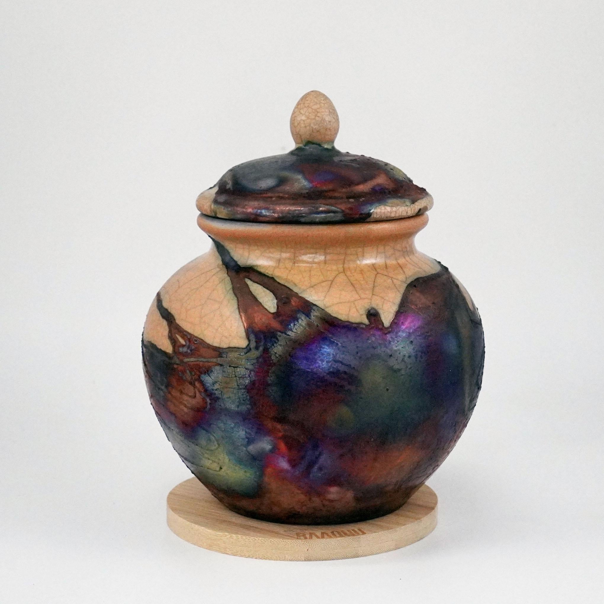 firing raku pottery creates a pattern that is